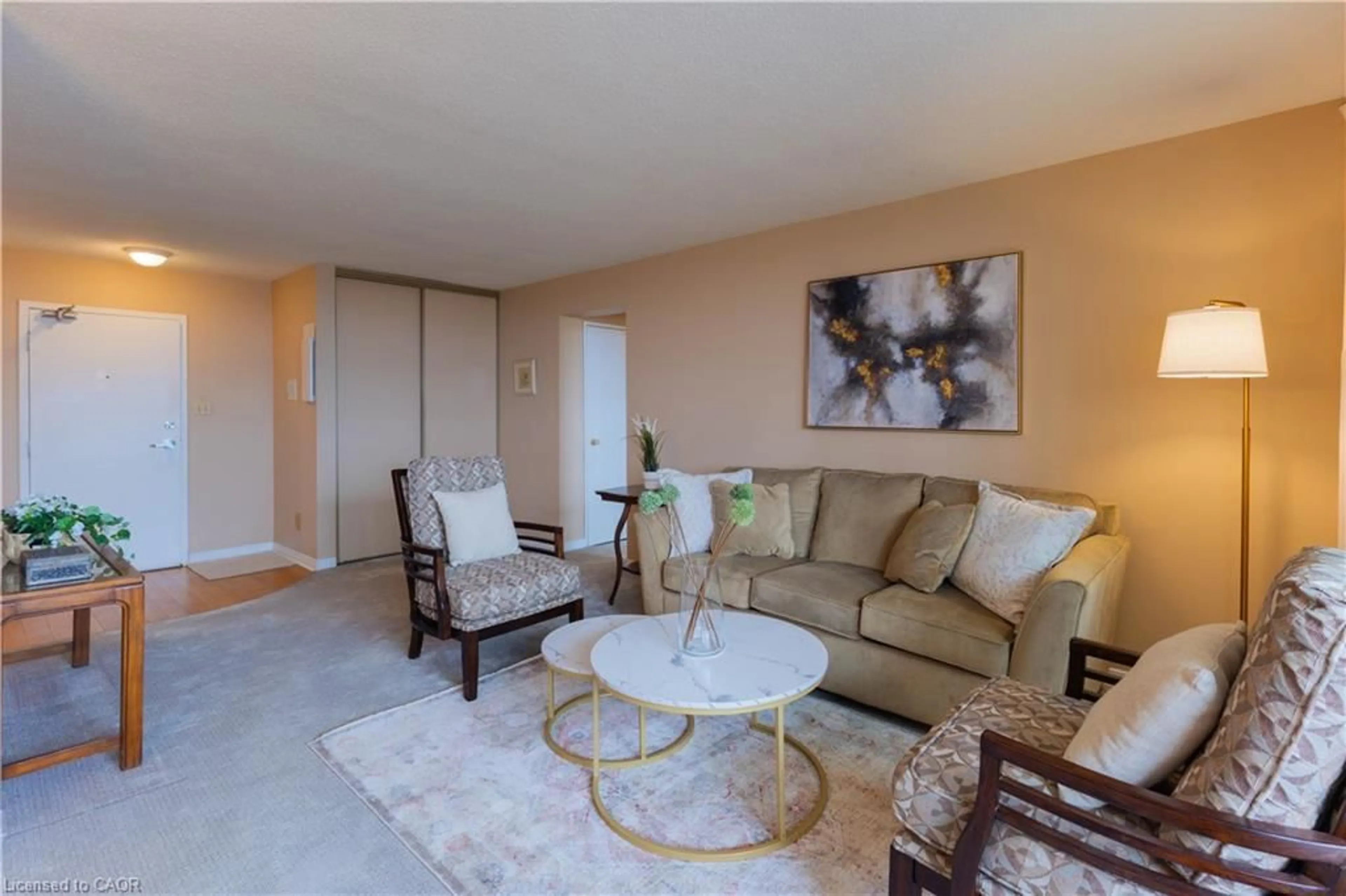 Living room with furniture, carpet floor for 225 Harvard Pl #1408, Waterloo Ontario N2J 4H4