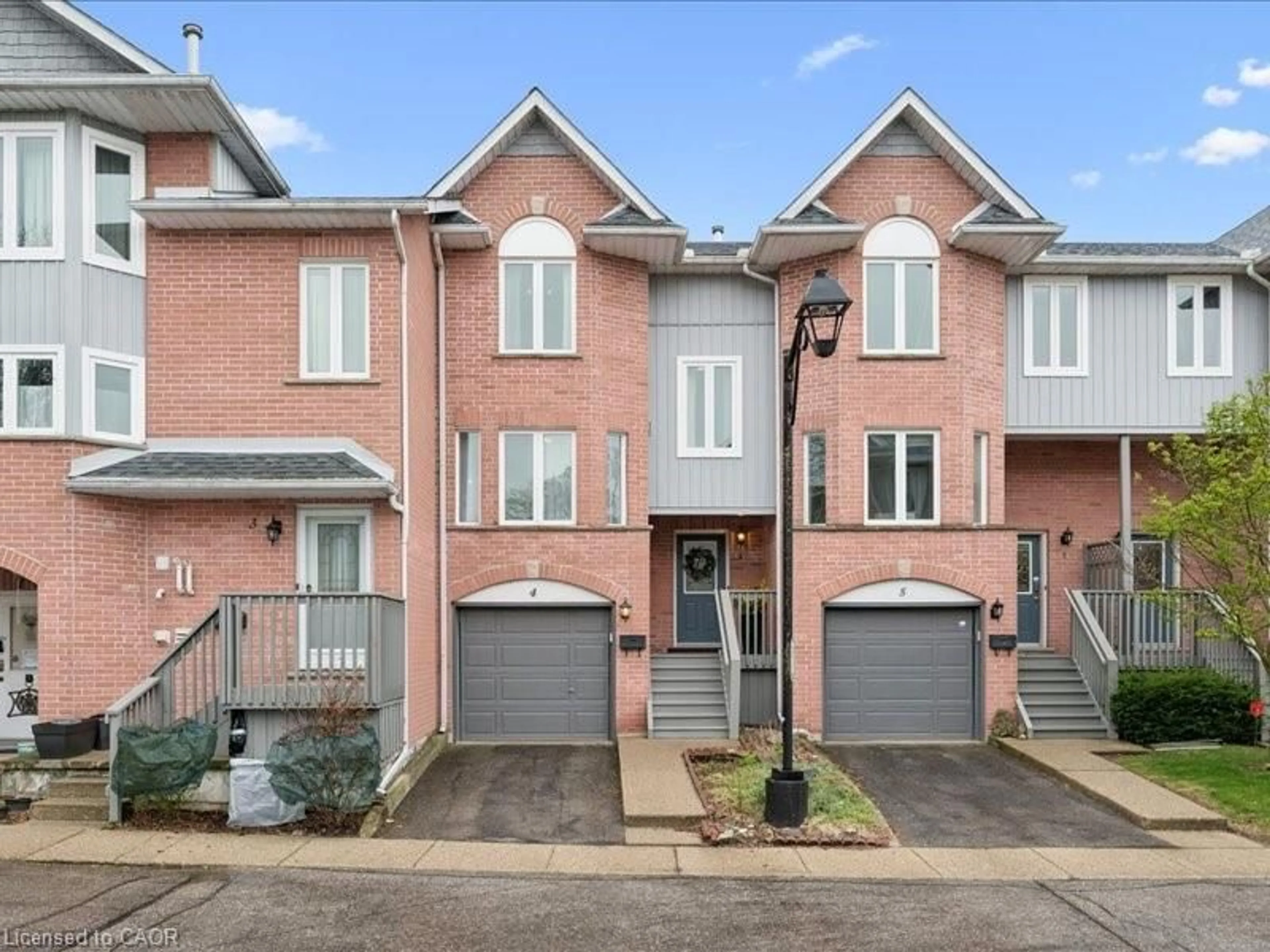 Home with brick exterior material, street for 245 Bishop St #4, Cambridge Ontario N3H 5N2