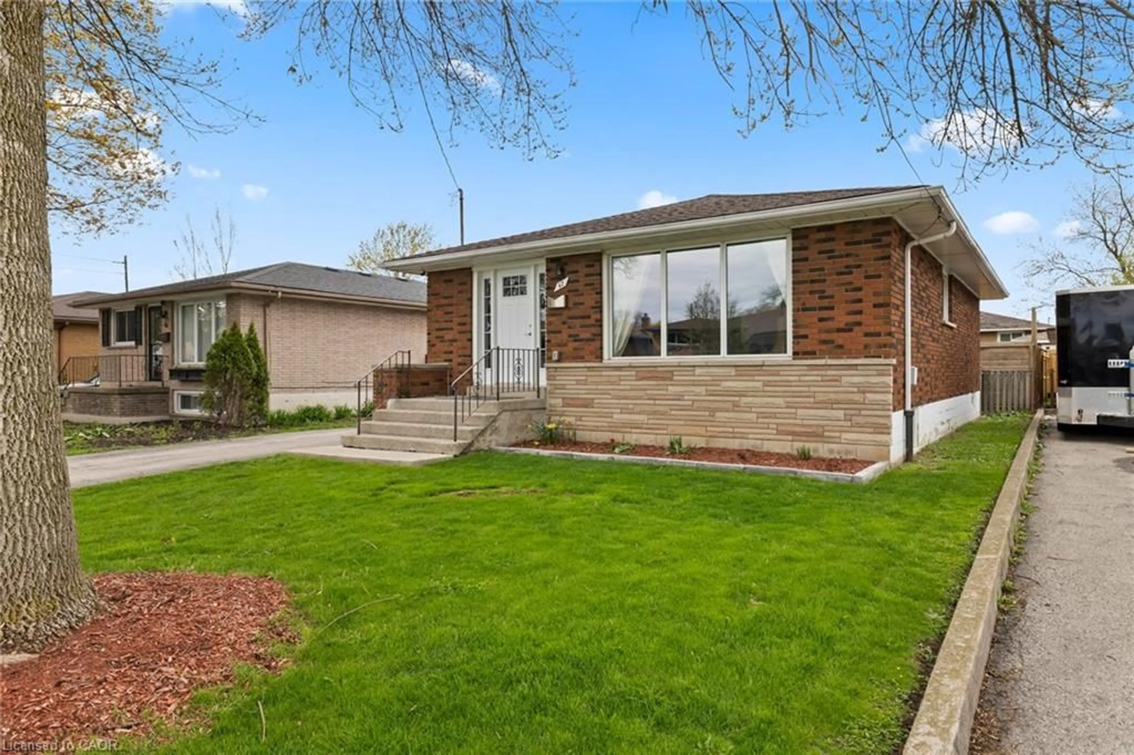 Home with brick exterior material, street for 42 Atwater Cres, Hamilton Ontario L9C 2E7