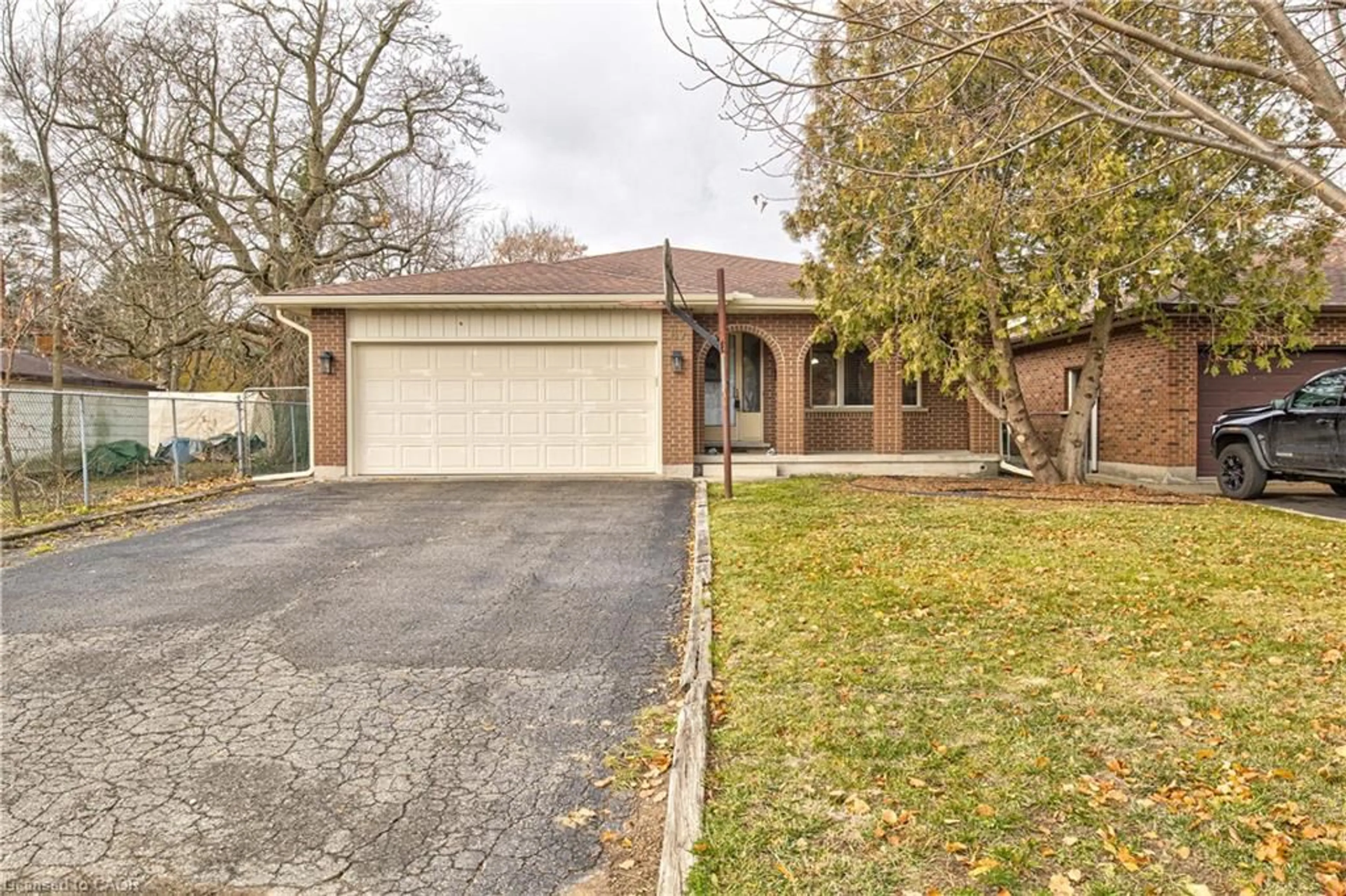 Home with brick exterior material, street for 67 Durham St, Kitchener Ontario N2P 1G5