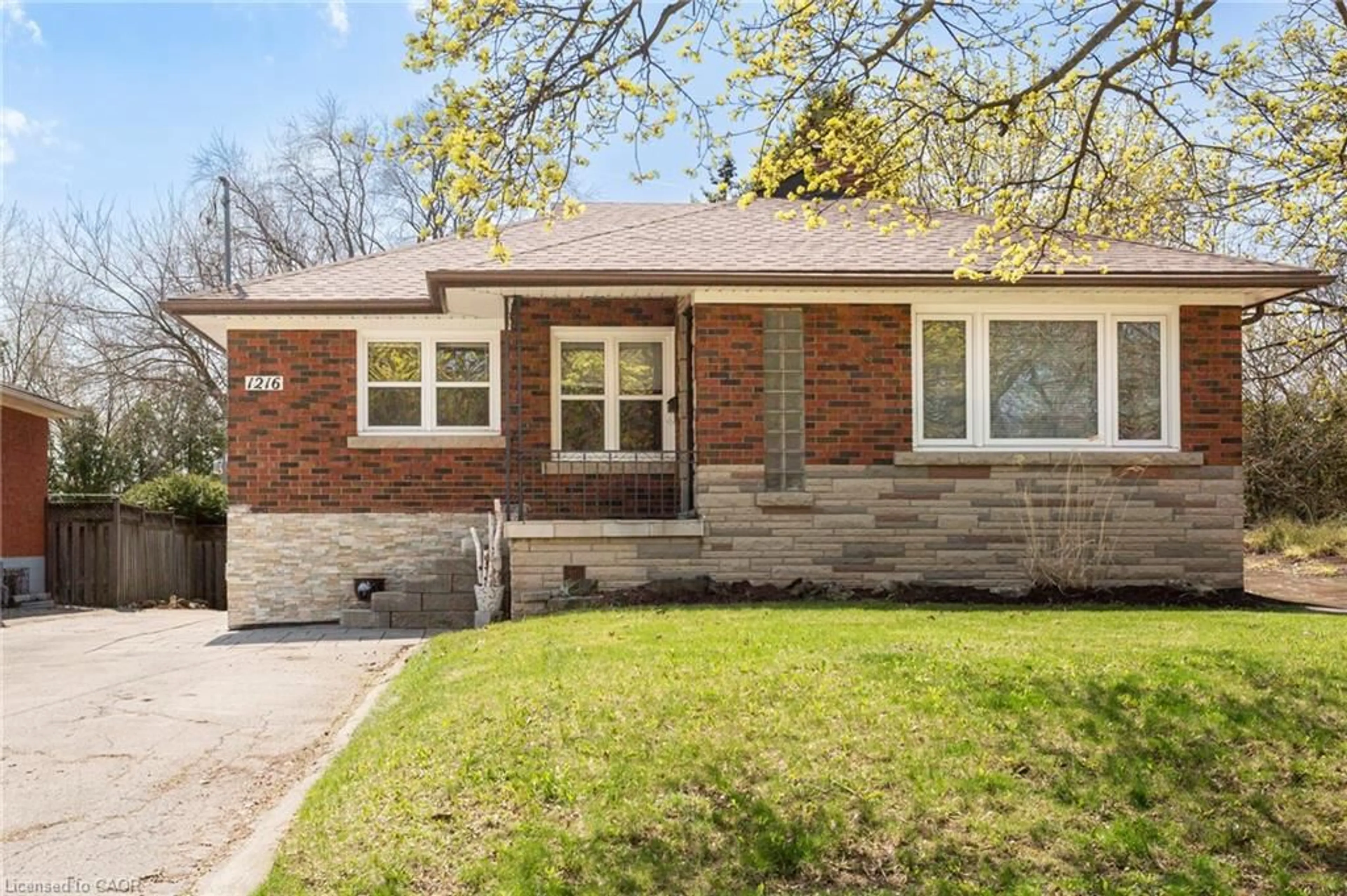 Home with brick exterior material, street for 1216 Fisher Ave, Burlington Ontario L7P 2L4