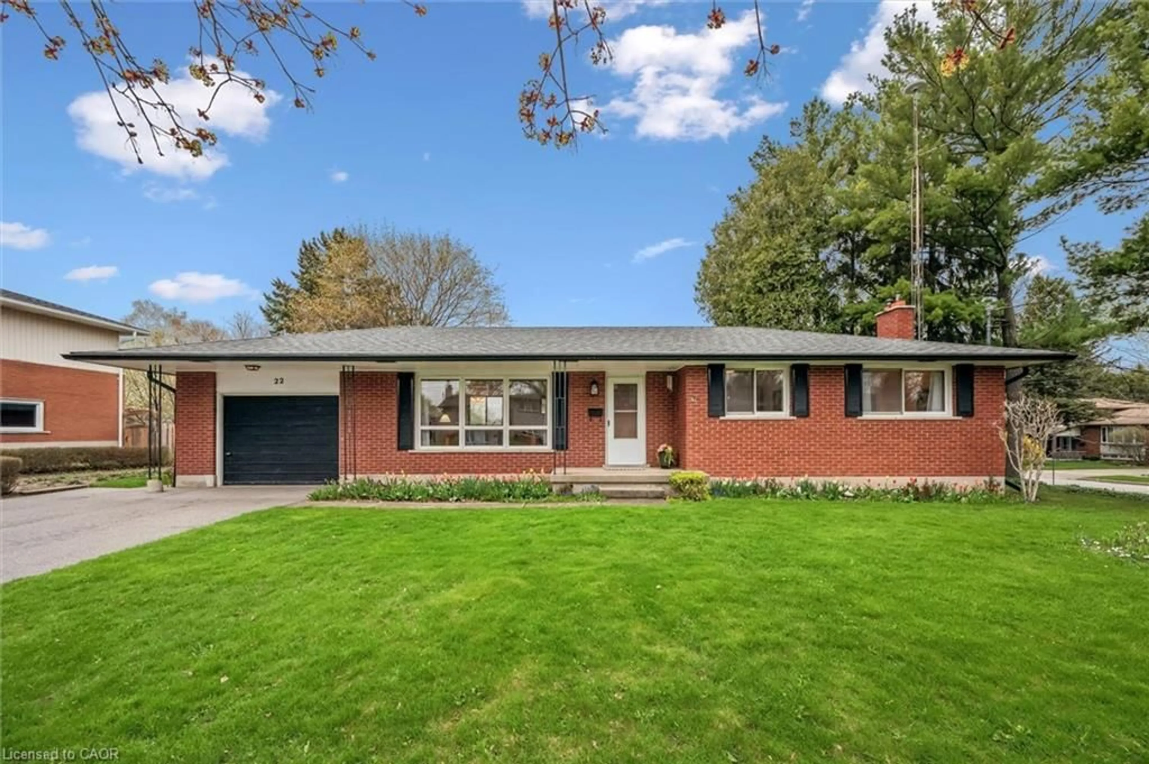 Home with brick exterior material, street for 22 Cheltonwood Ave, Guelph Ontario N1E 4E3
