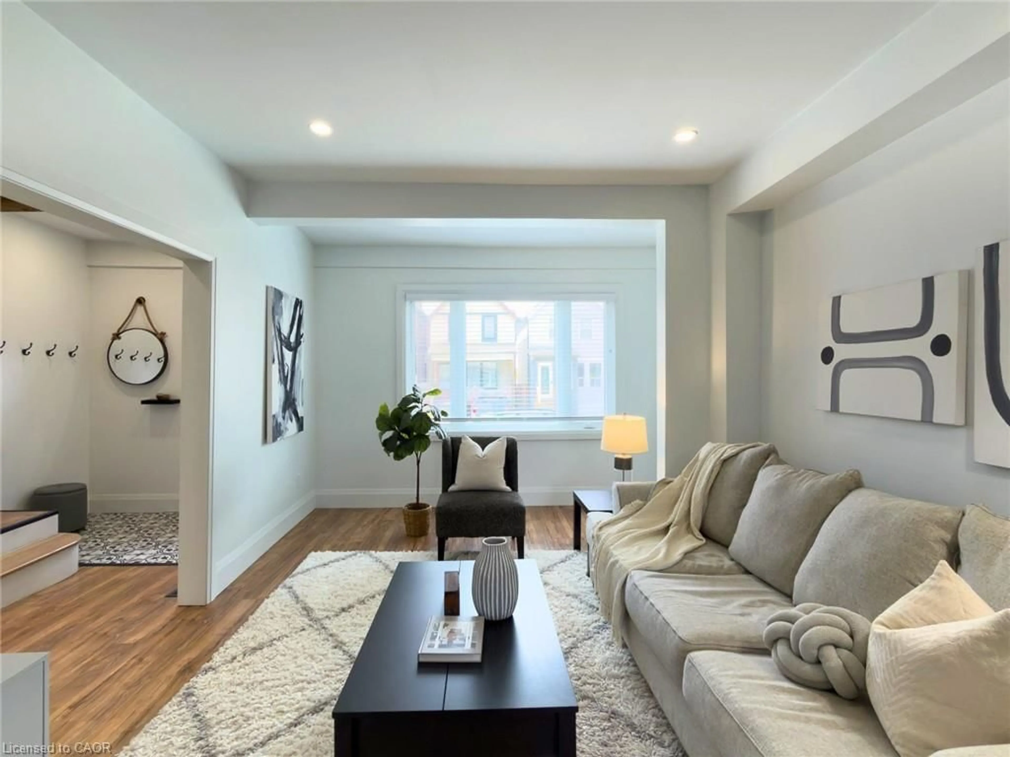 Living room with furniture, unknown for 138 Cavell Ave, Hamilton Ontario L8L 7E5