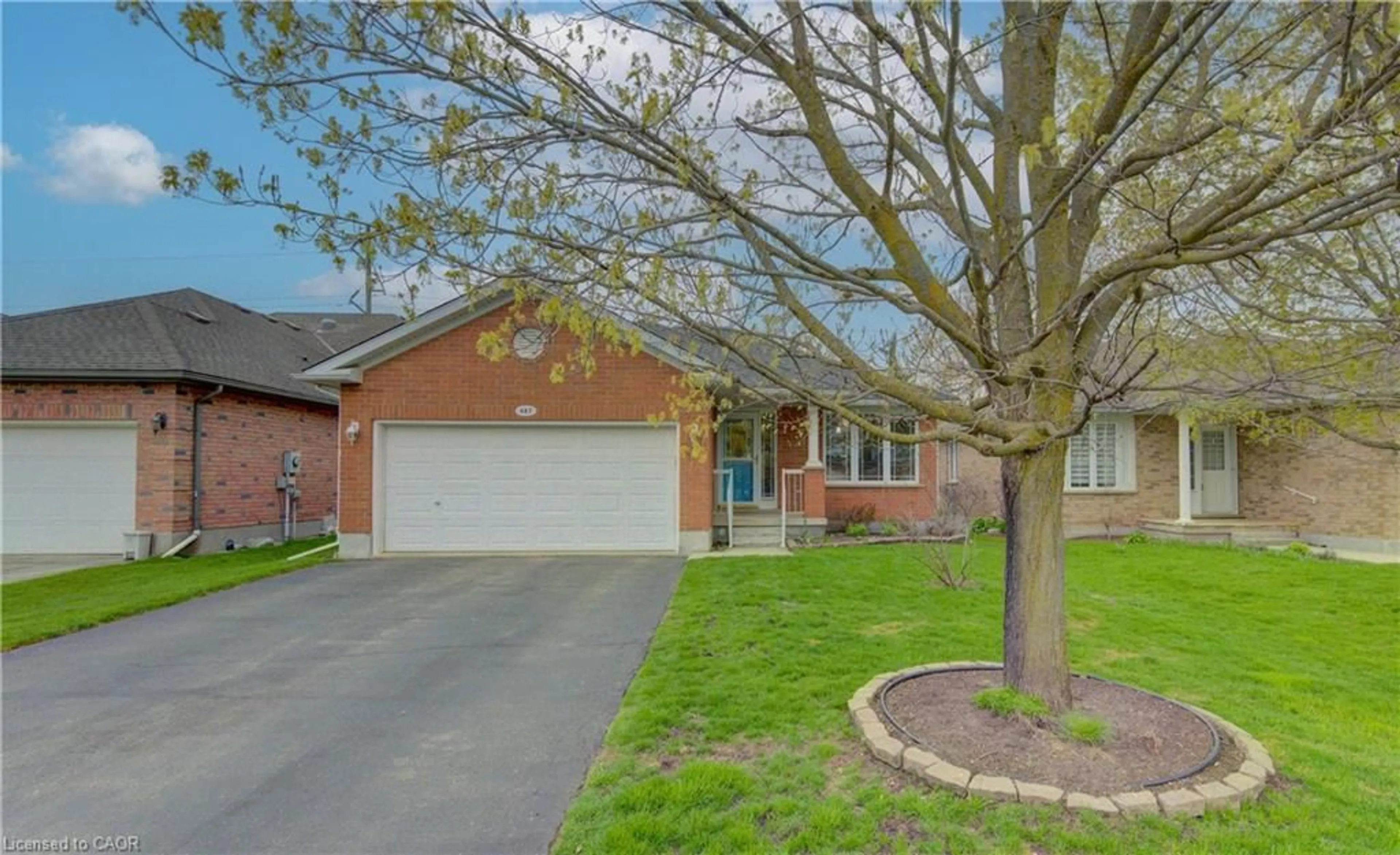 Home with brick exterior material, street for 487 Brentcliffe Dr, Waterloo Ontario N2T 2R8