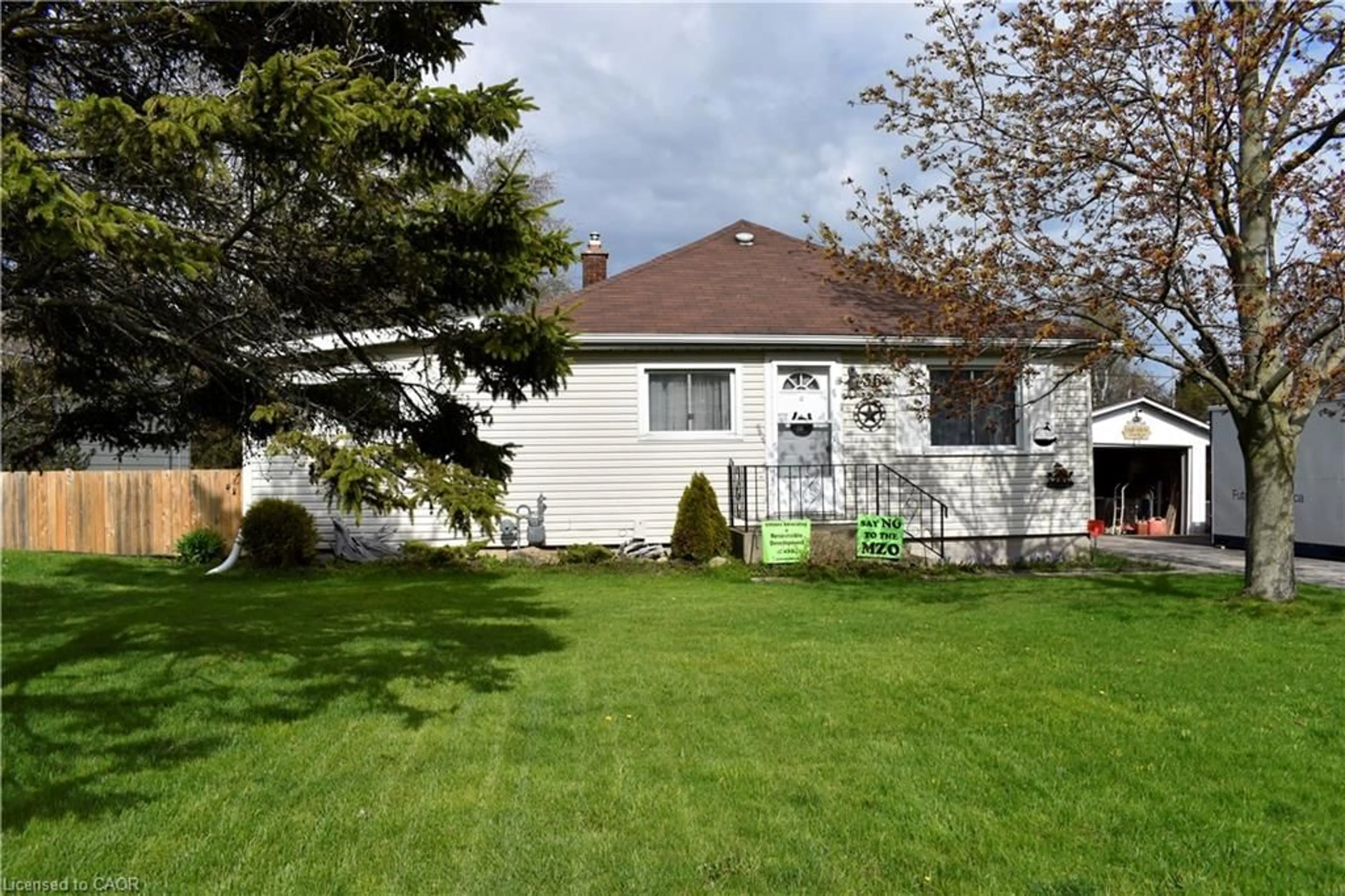 Home with vinyl exterior material, street for 36 Woodhouse Ave, Port Dover Ontario N0A 1N8