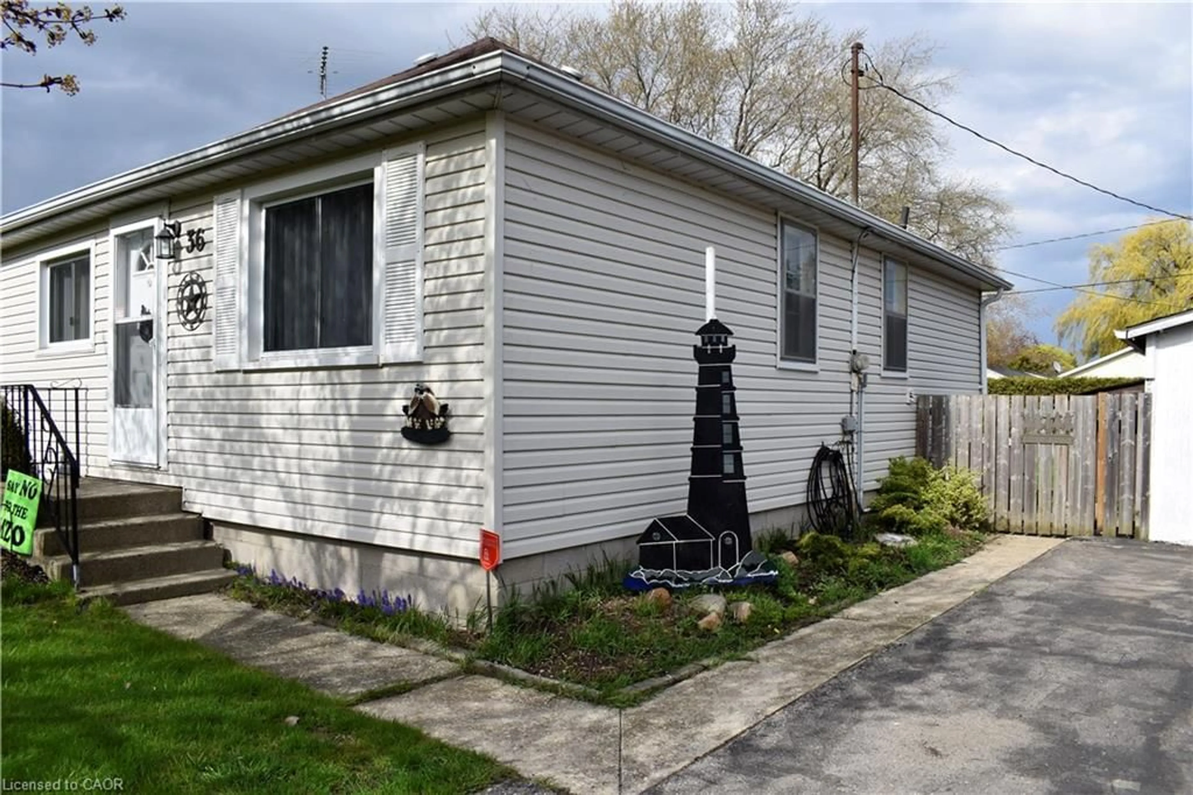 Home with vinyl exterior material, street for 36 Woodhouse Ave, Port Dover Ontario N0A 1N8
