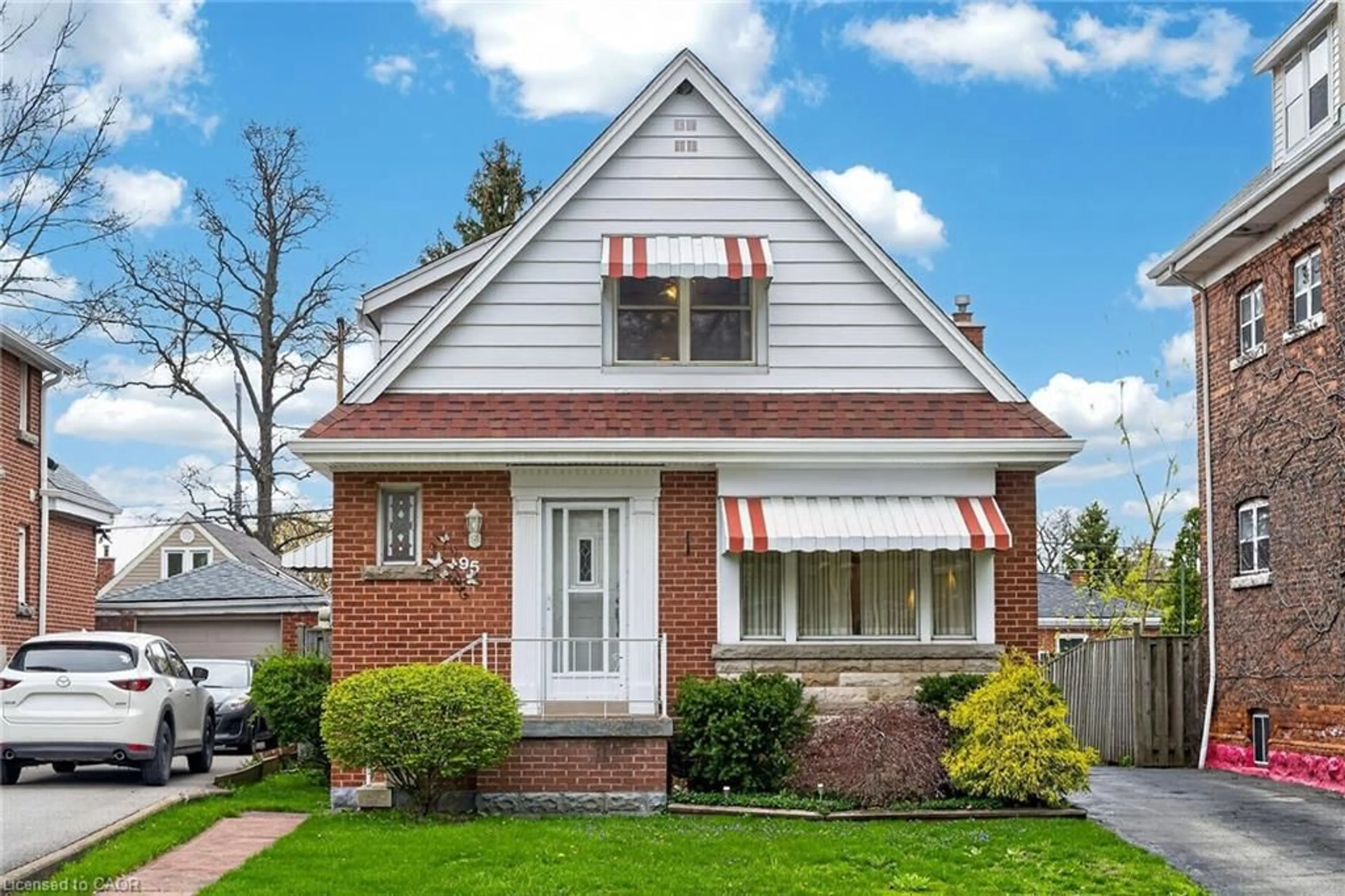 Home with brick exterior material, street for 95 Empress Ave, Hamilton Ontario L9A 1M5