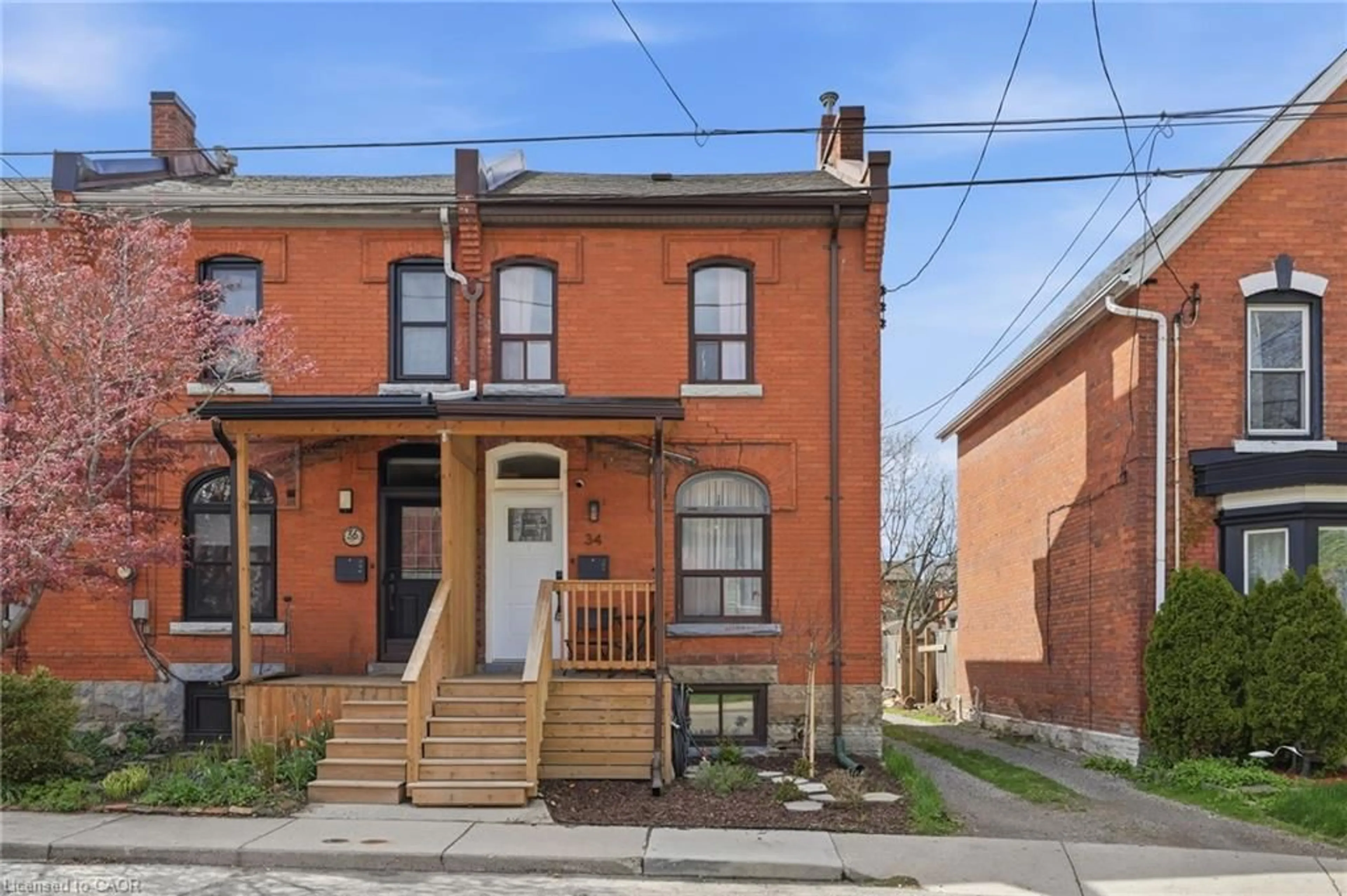 Home with brick exterior material, street for 34 Baillie St, Hamilton Ontario L8N 2K5
