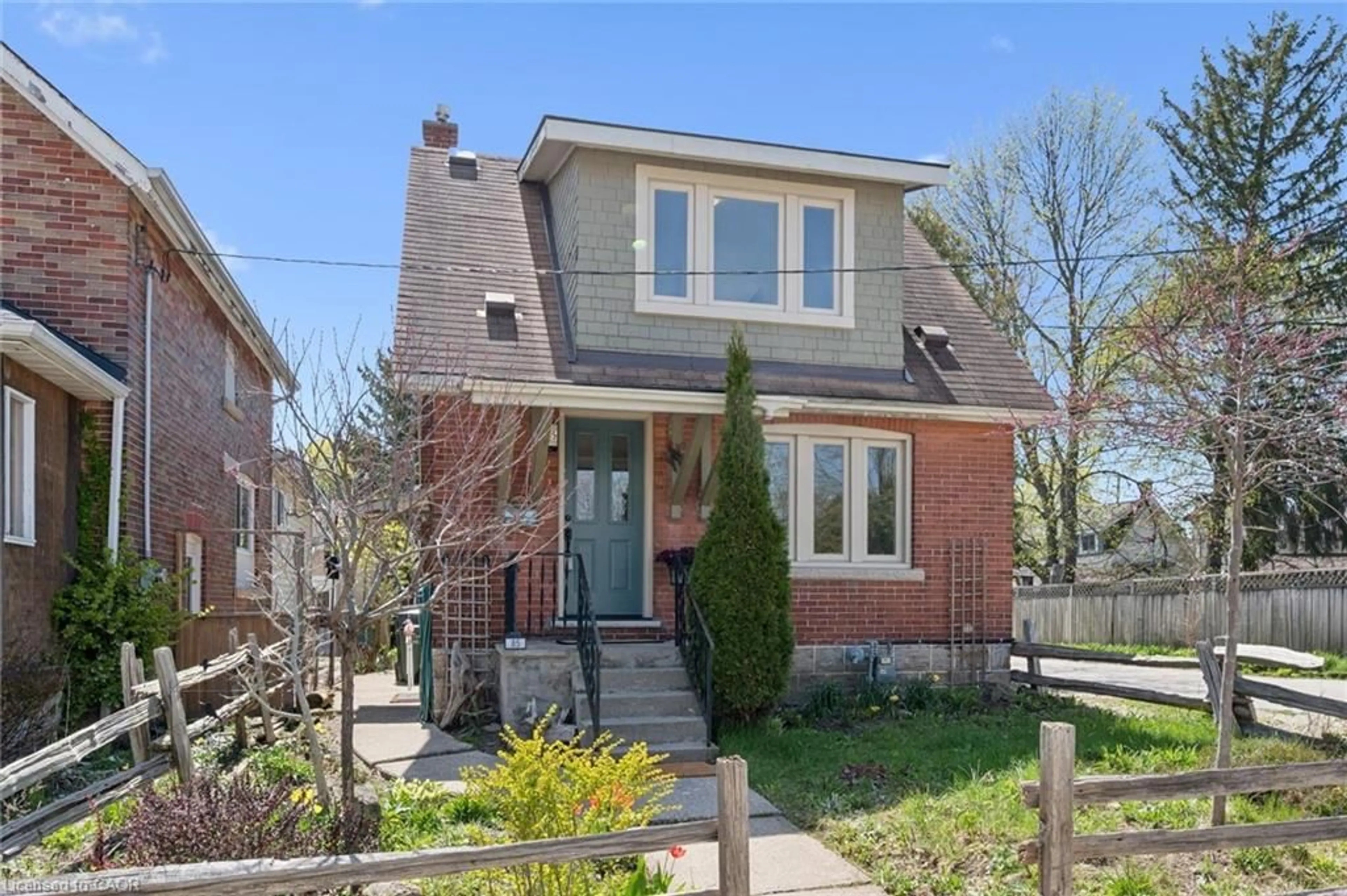 Home with brick exterior material, street for 85 Audrey Ave, Guelph Ontario N1E 5Y1