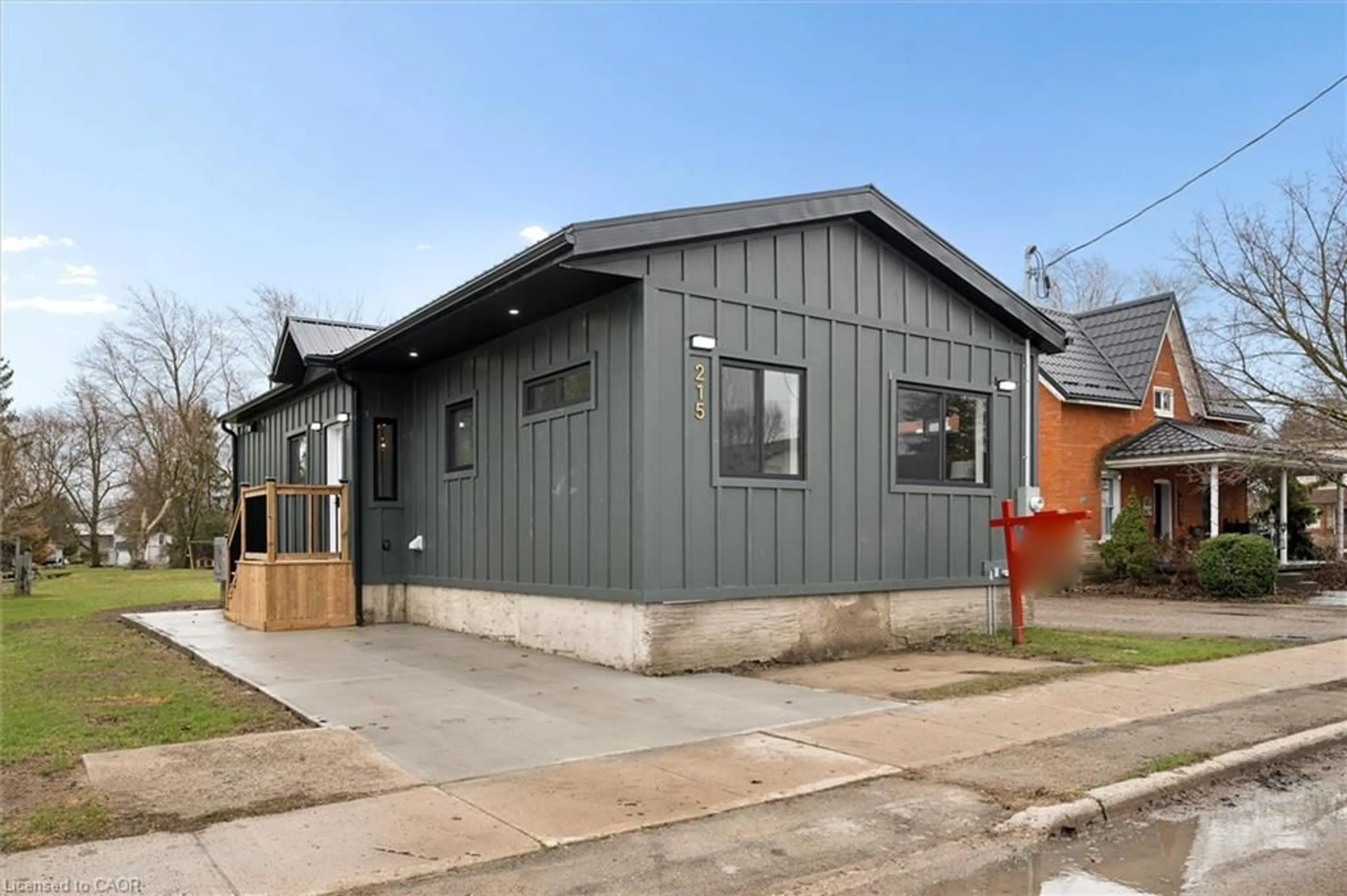 Home with vinyl exterior material, street for 215 Winstanley St, Monkton Ontario N0K 1P0