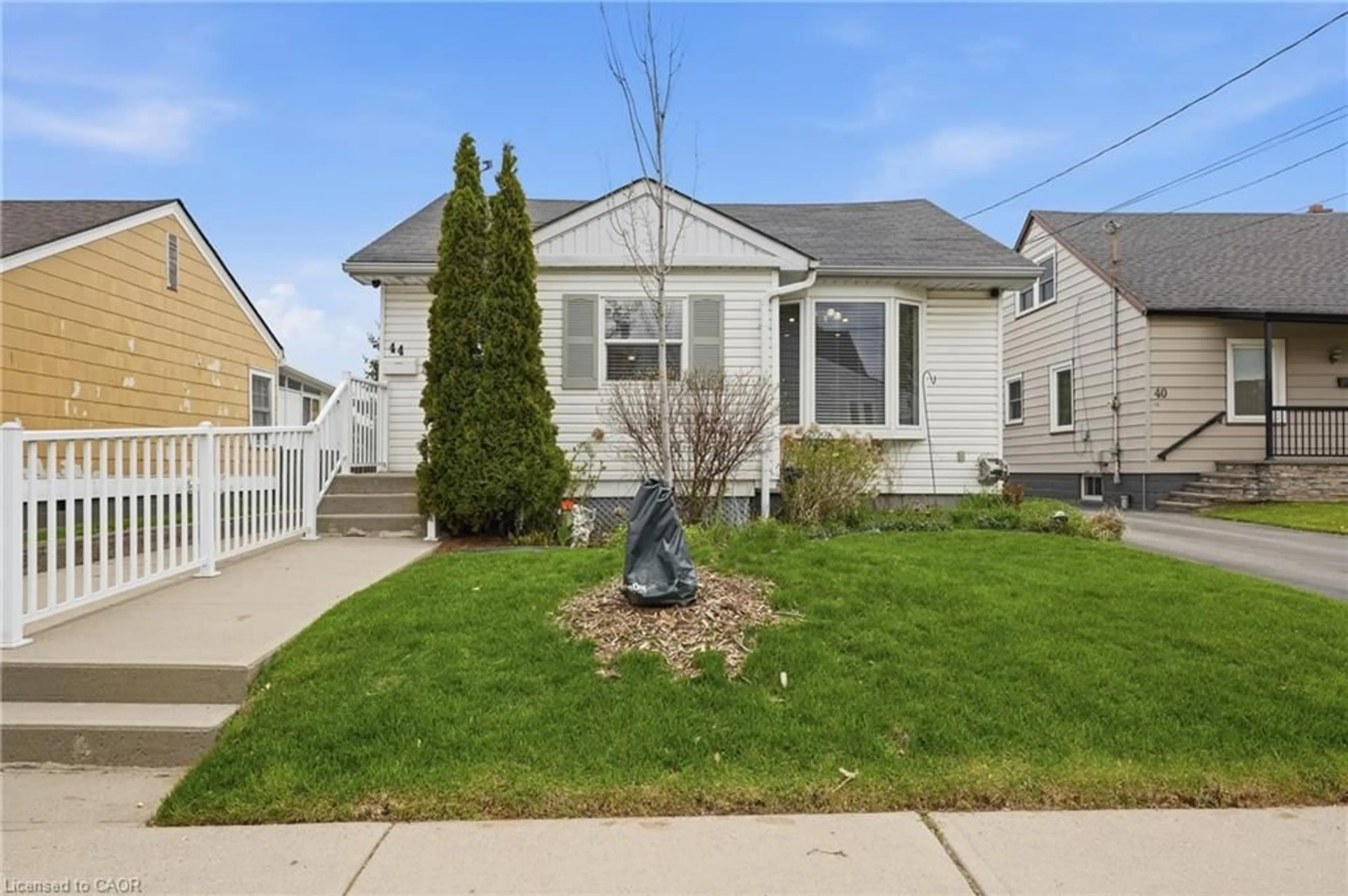 Home with vinyl exterior material, street for 44 Selkirk Ave, Hamilton Ontario L8H 5L7