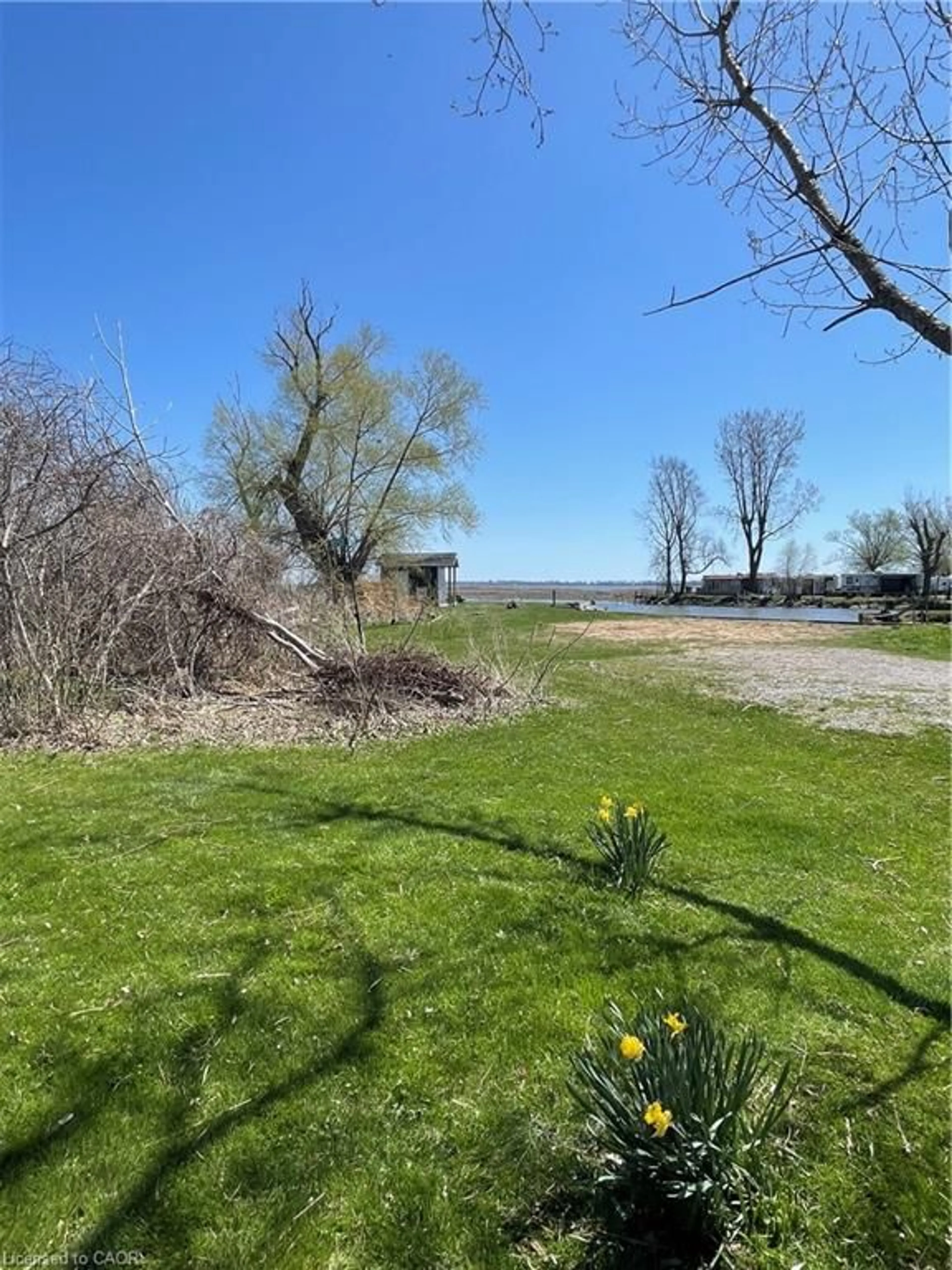 A pic from outside/outdoor area/front of a property/back of a property/a pic from drone, water/lake/river/ocean view for 1012 William Lane, Long Point Ontario N0E 1M0