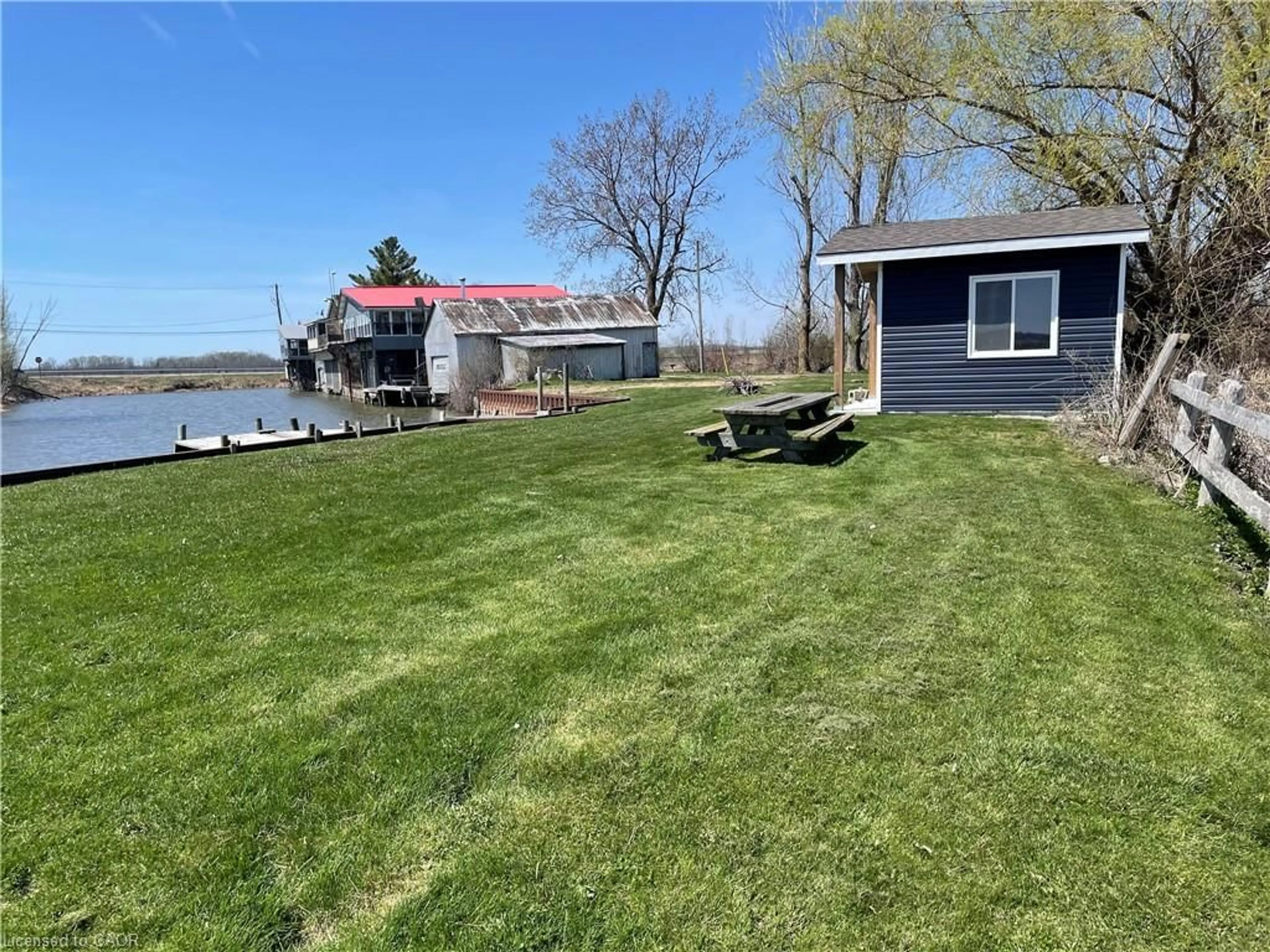 A pic from outside/outdoor area/front of a property/back of a property/a pic from drone, water/lake/river/ocean view for 1012 William Lane, Long Point Ontario N0E 1M0