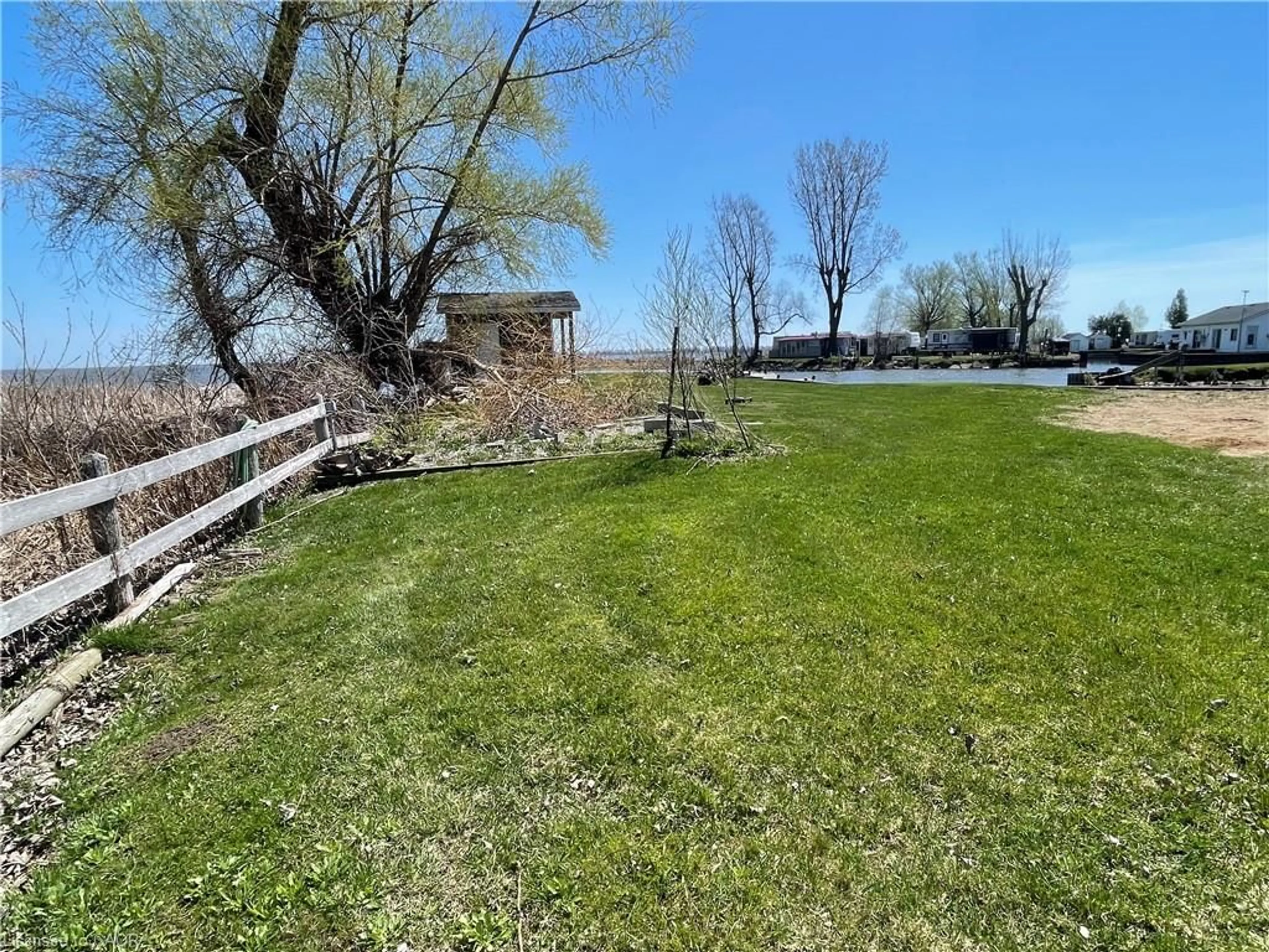A pic from outside/outdoor area/front of a property/back of a property/a pic from drone, water/lake/river/ocean view for 1012 William Lane, Long Point Ontario N0E 1M0