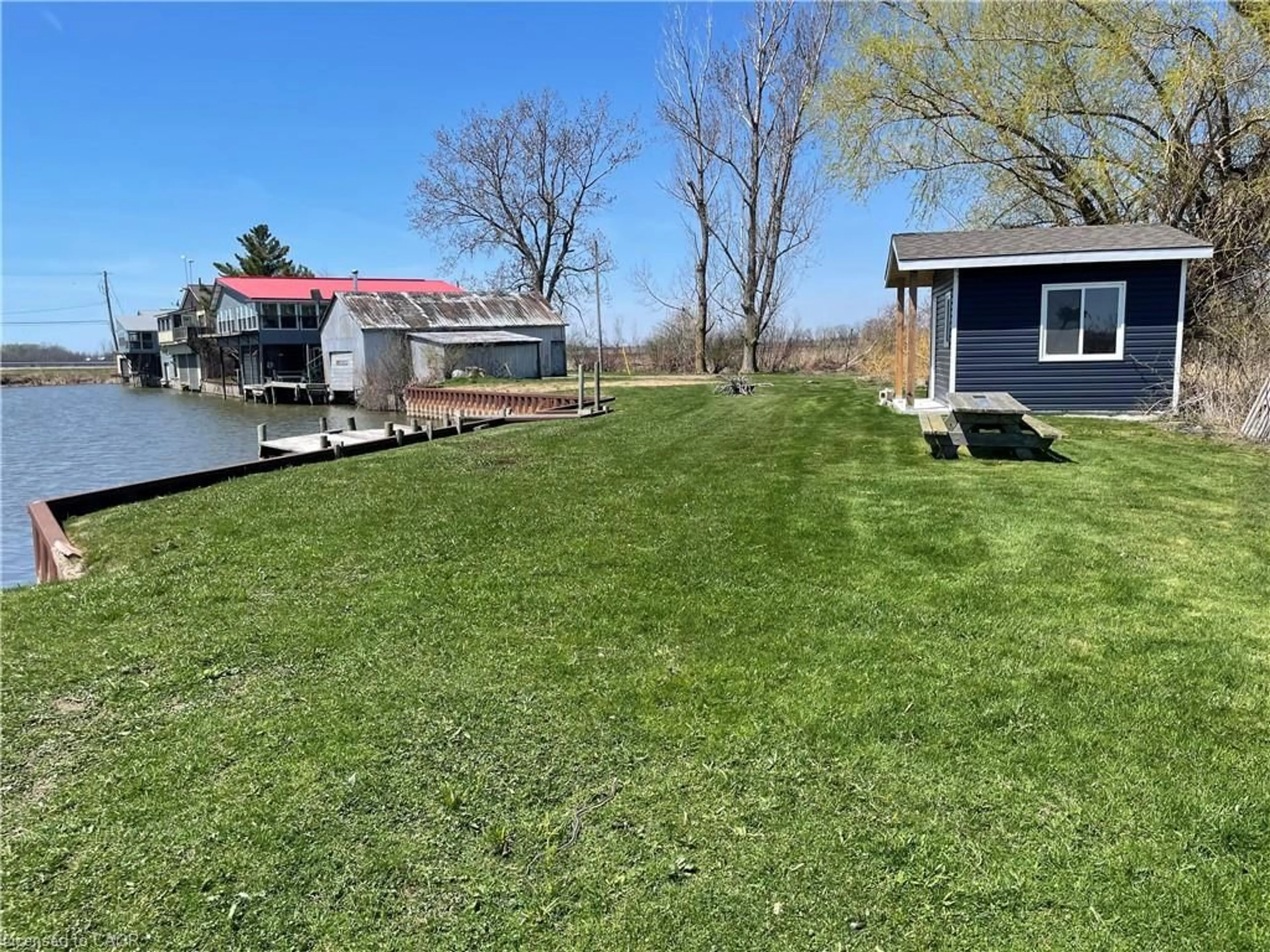 A pic from outside/outdoor area/front of a property/back of a property/a pic from drone, water/lake/river/ocean view for 1012 William Lane, Long Point Ontario N0E 1M0