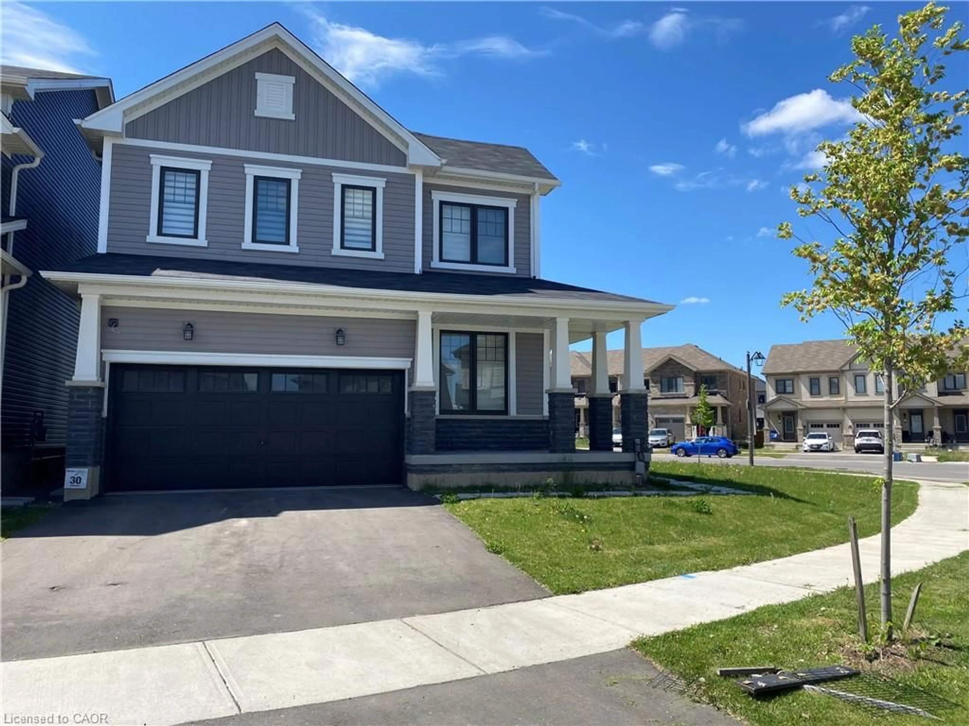 Home with vinyl exterior material, street for 2 Cahill Dr, Brantford Ontario N3T 0V5