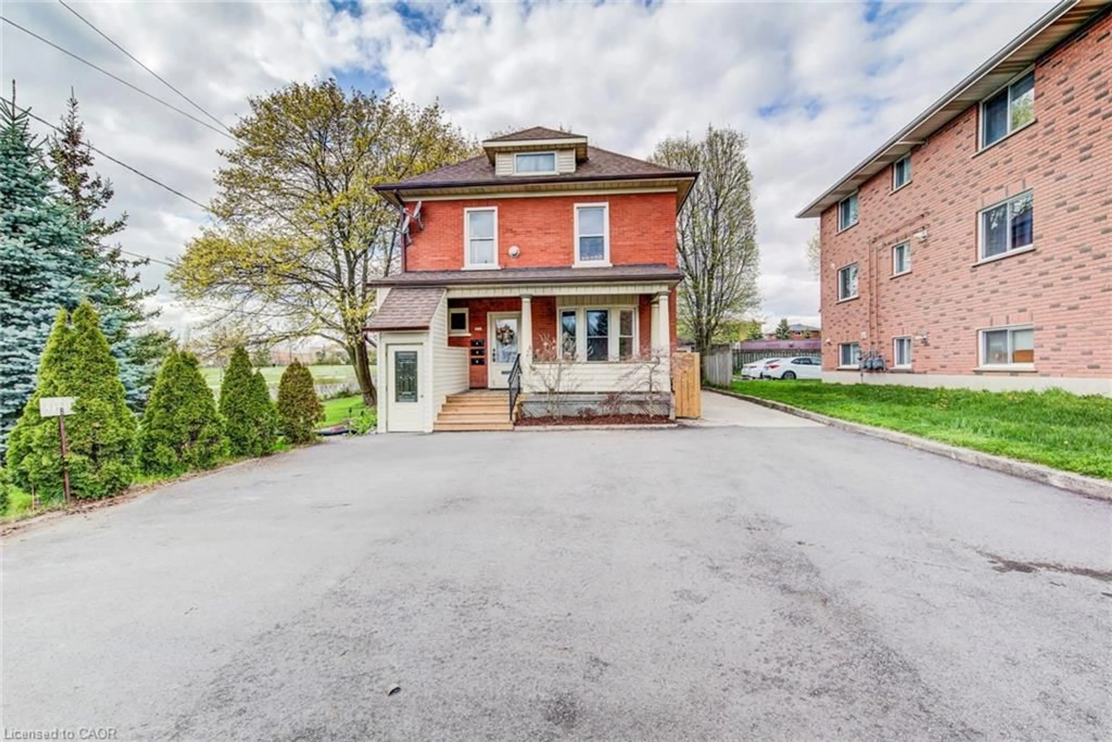Home with brick exterior material, street for 306 Guelph St, Kitchener Ontario N2H 5X3
