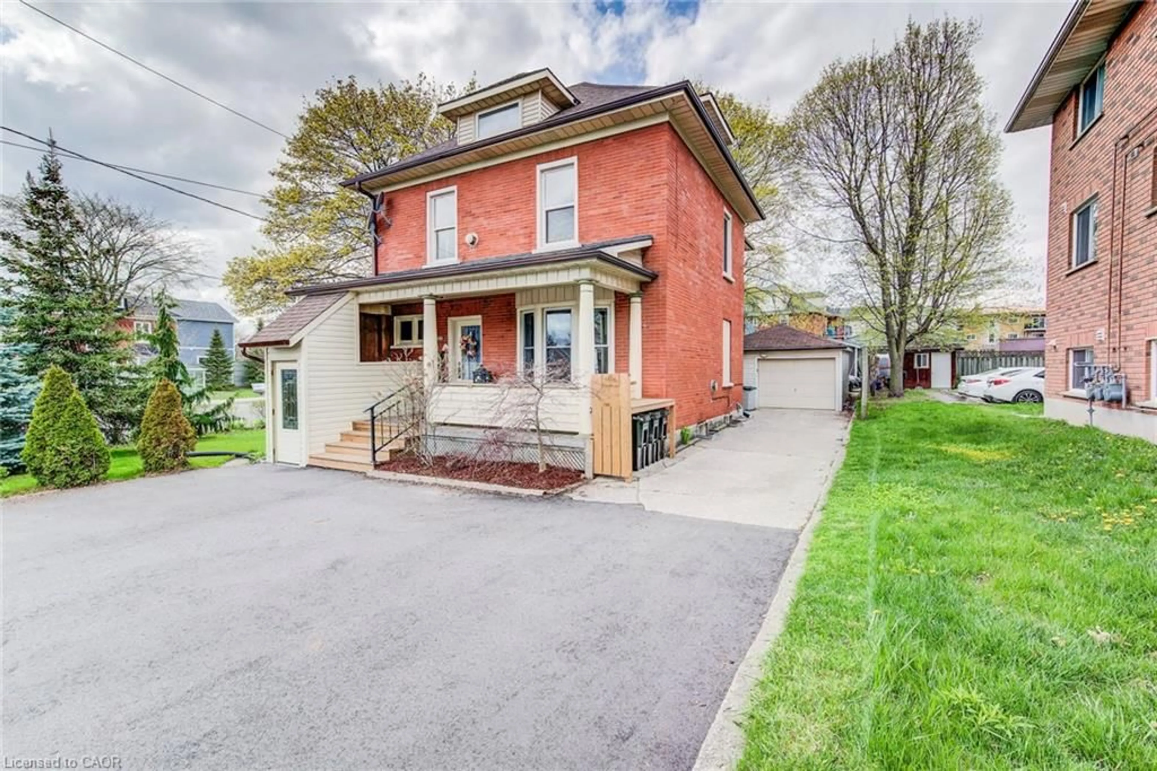 Home with brick exterior material, street for 306 Guelph St, Kitchener Ontario N2H 5X3