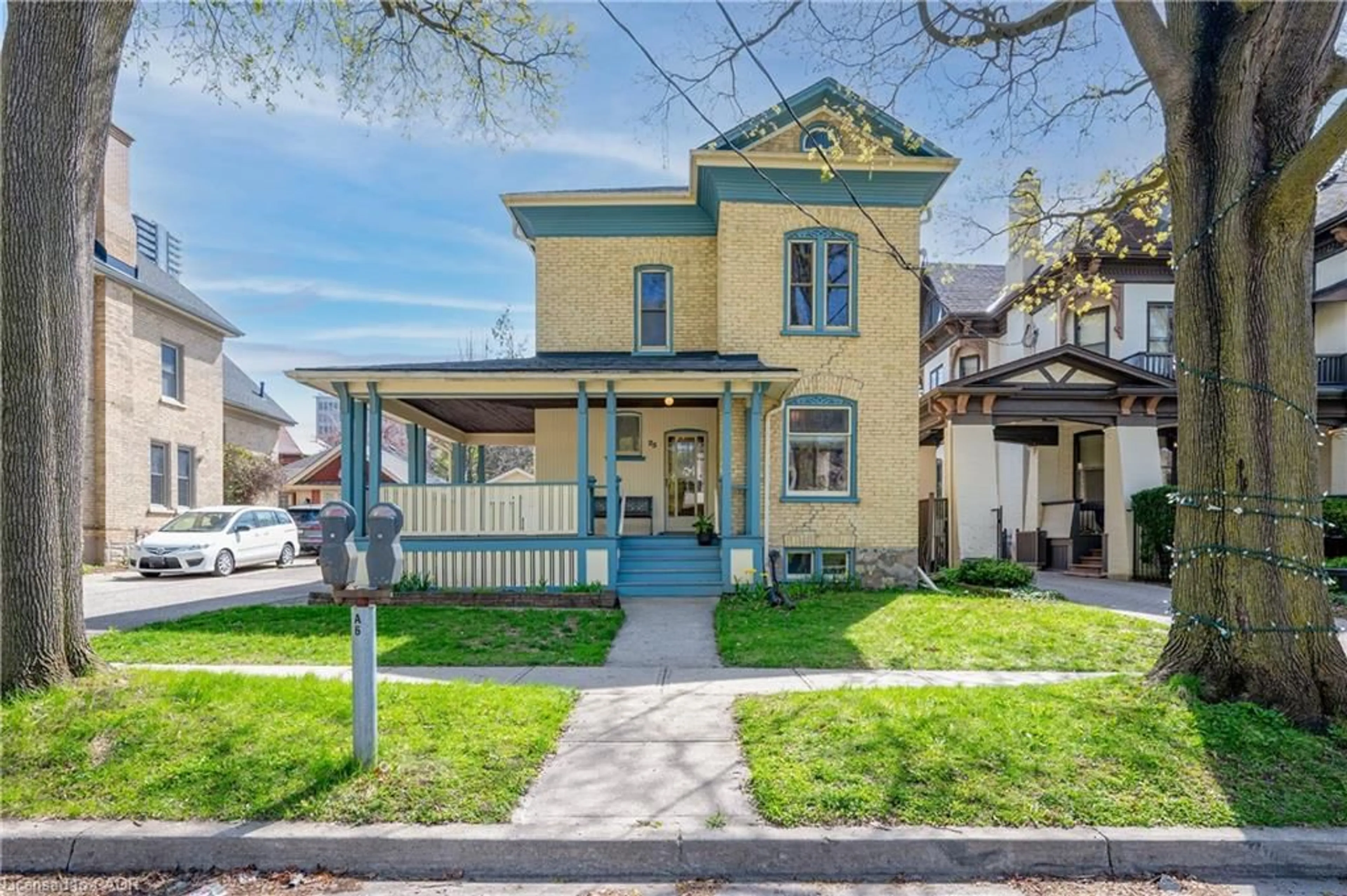 Home with brick exterior material, street for 25 Ahrens St, Kitchener Ontario N2H 4B6