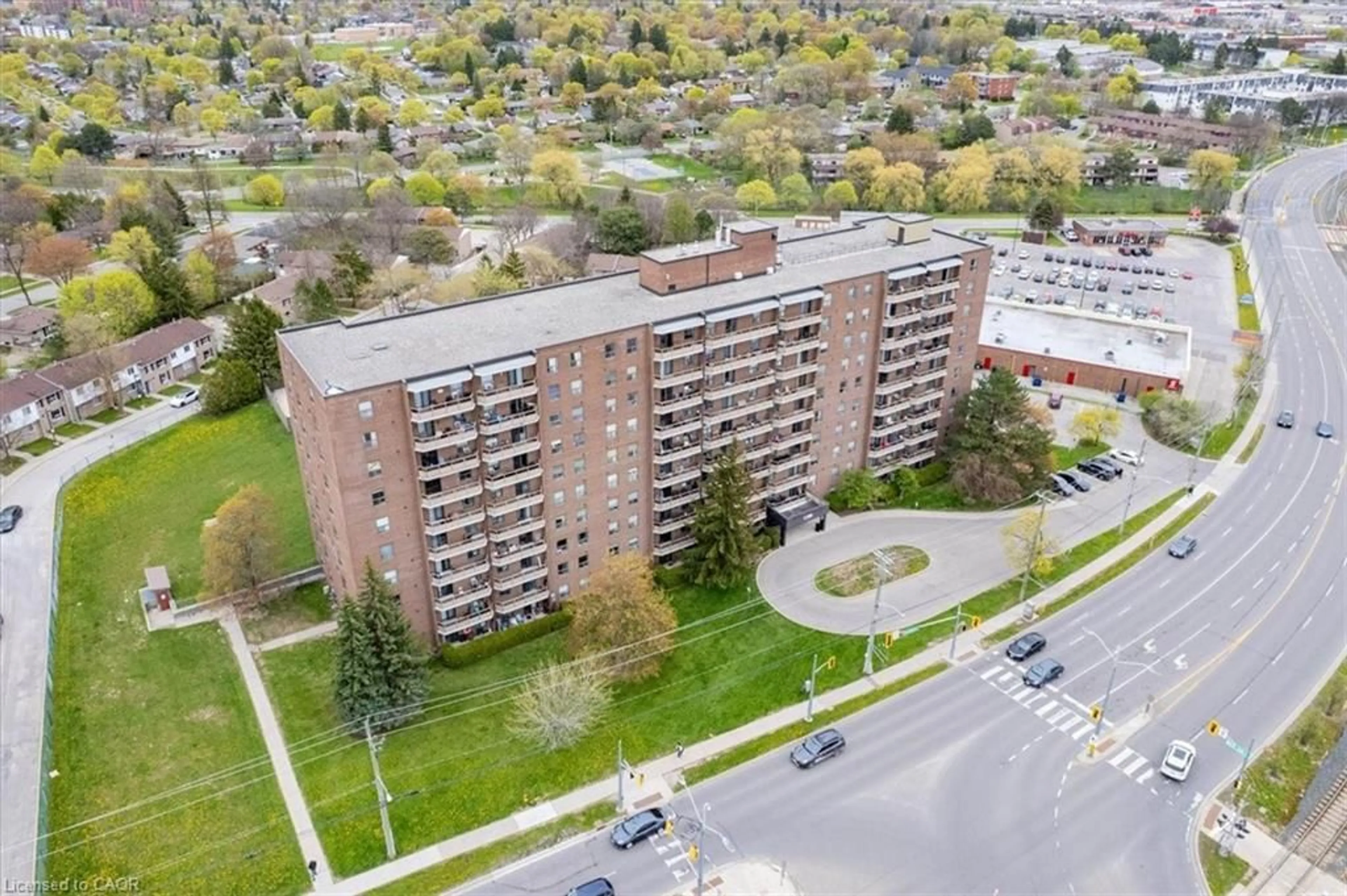 A pic from outside/outdoor area/front of a property/back of a property/a pic from drone, city buildings view from balcony for 1100 Courtland Ave #407, Kitchener Ontario N2C 2H9