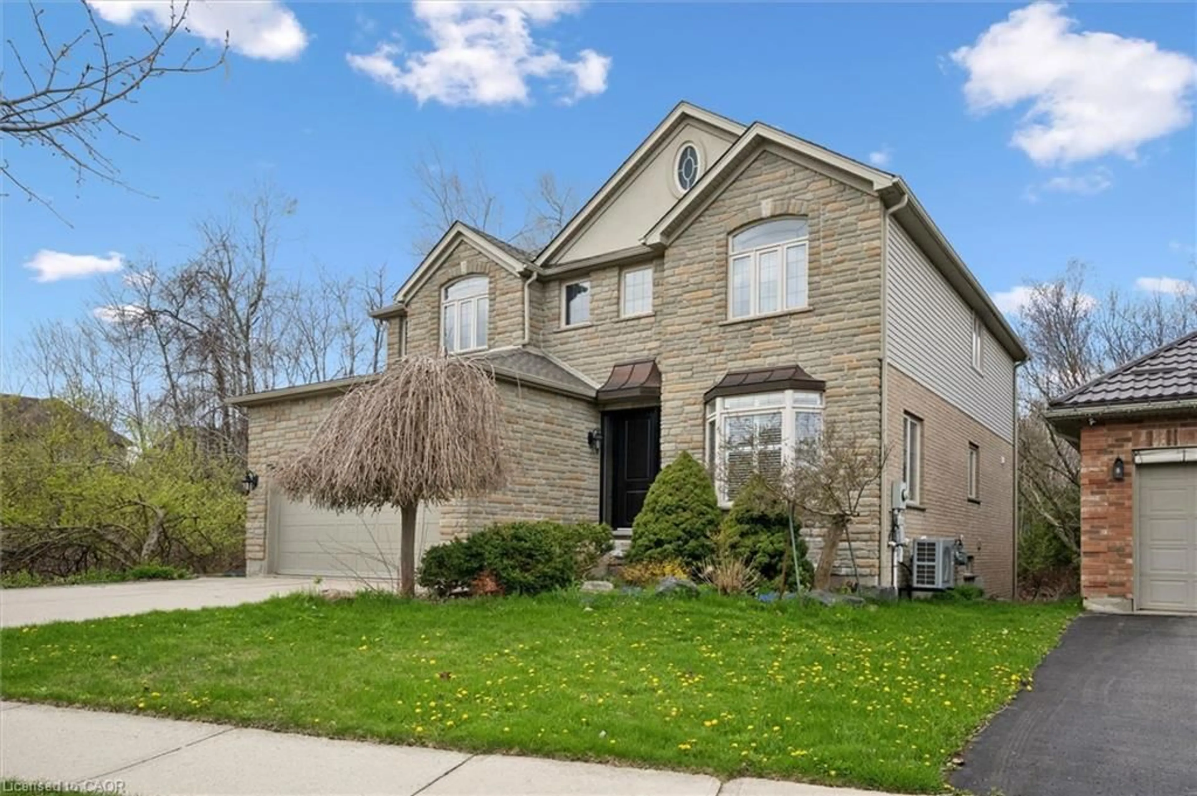 Home with brick exterior material, street for 872 Creekside Dr, Waterloo Ontario N2V 2S7