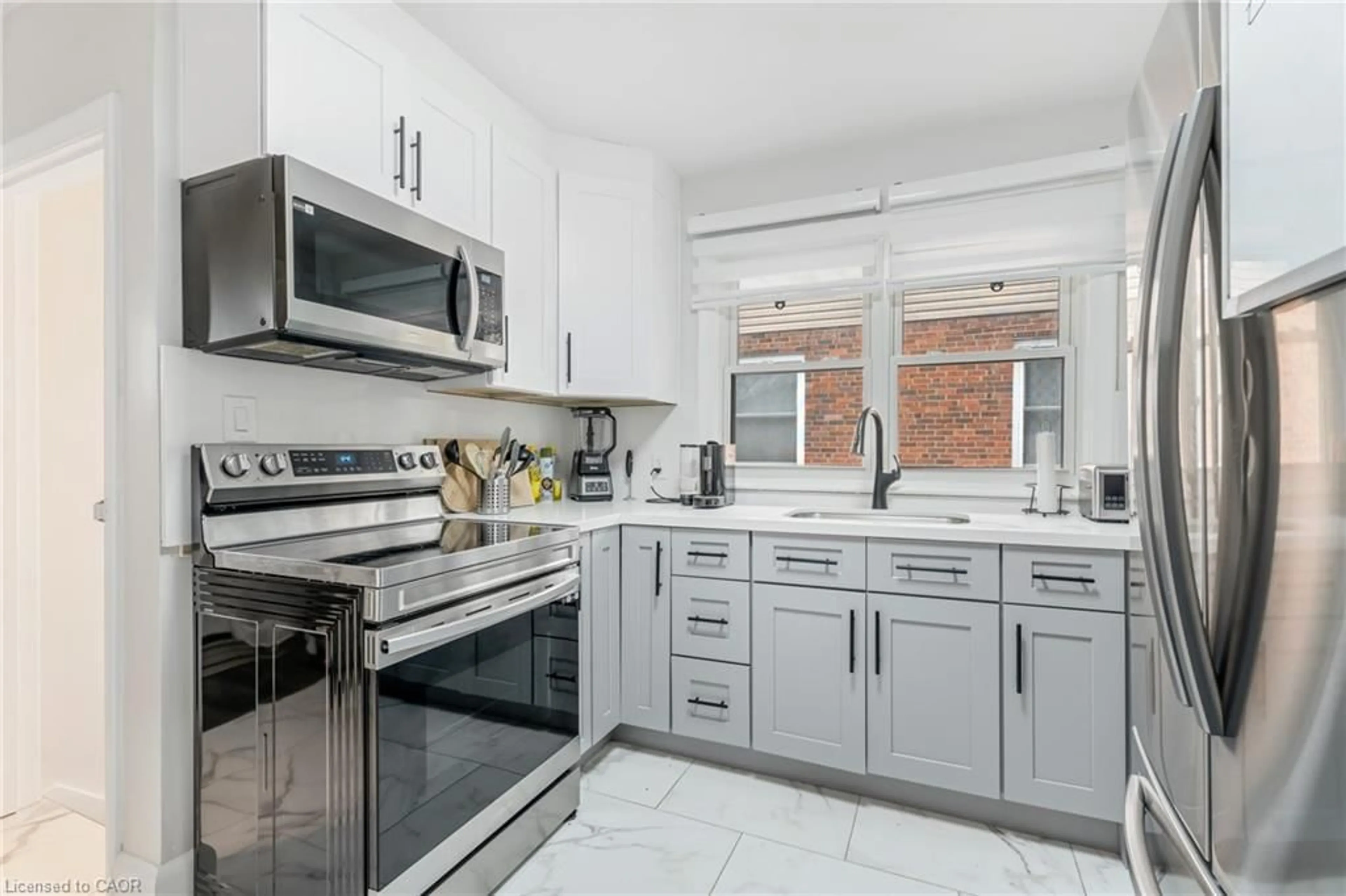 Open concept kitchen, ceramic/tile floor for 284 Bowman St, Hamilton Ontario L8S 2V3