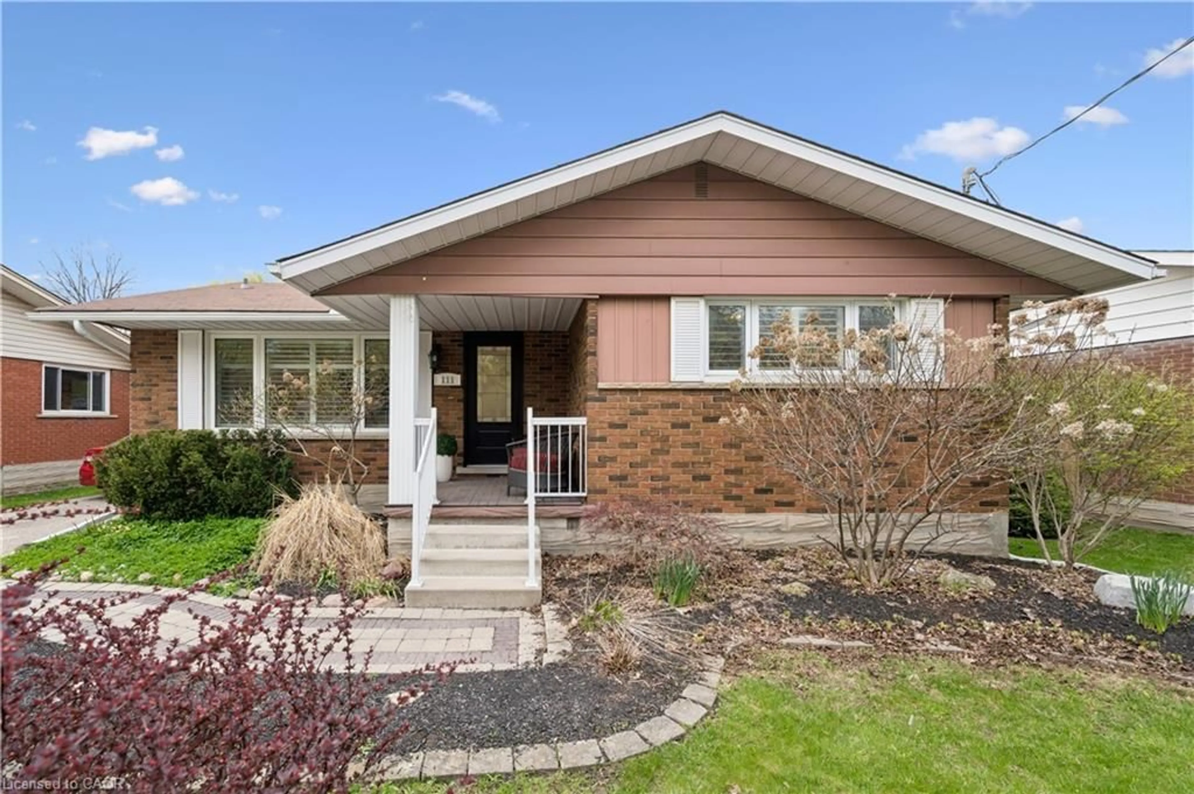 Home with brick exterior material, street for 111 Ruskview Rd, Kitchener Ontario N2M 4S1