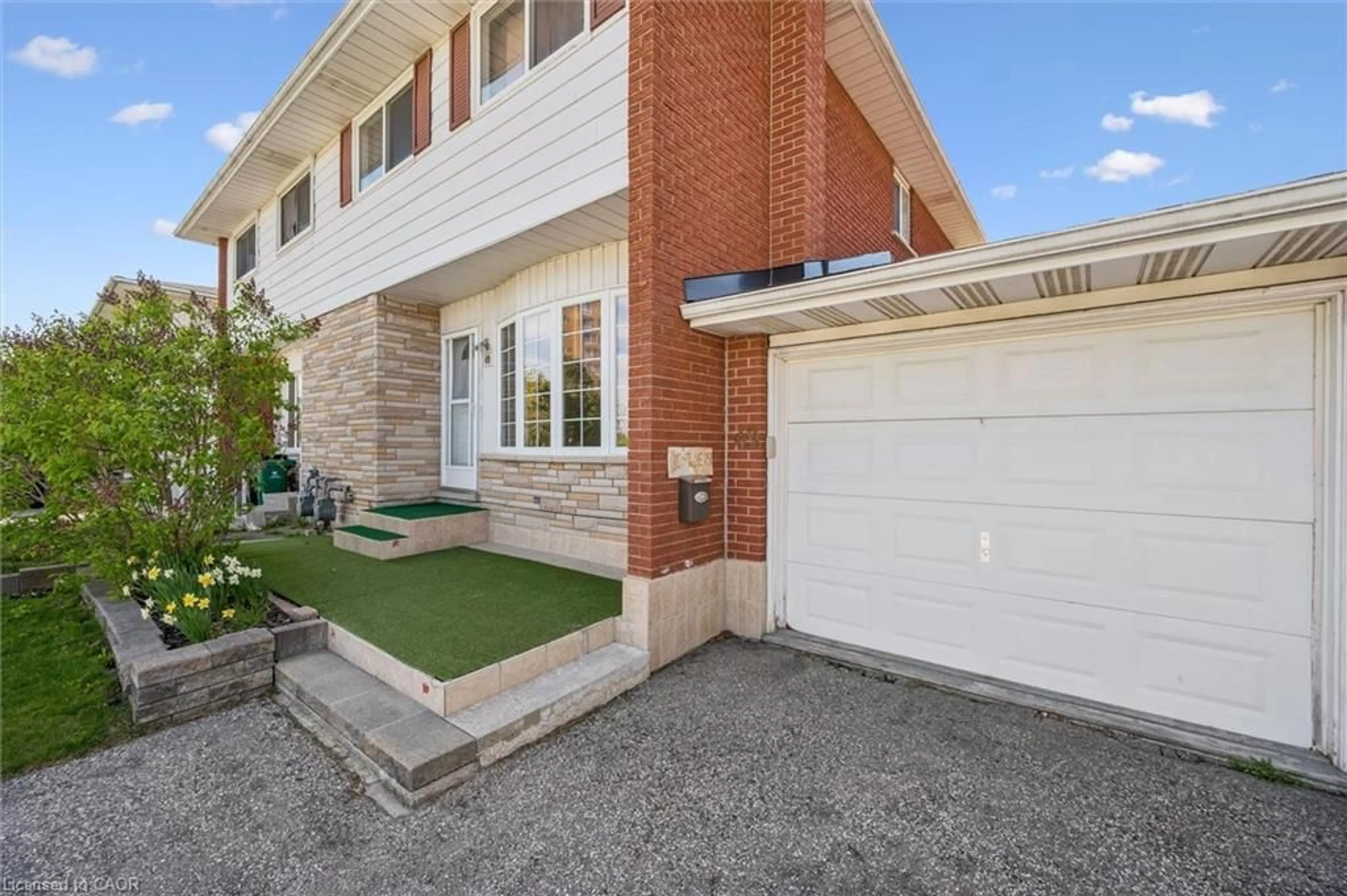 Home with brick exterior material, street for 49 Overlea Dr, Kitchener Ontario N2M 1S9
