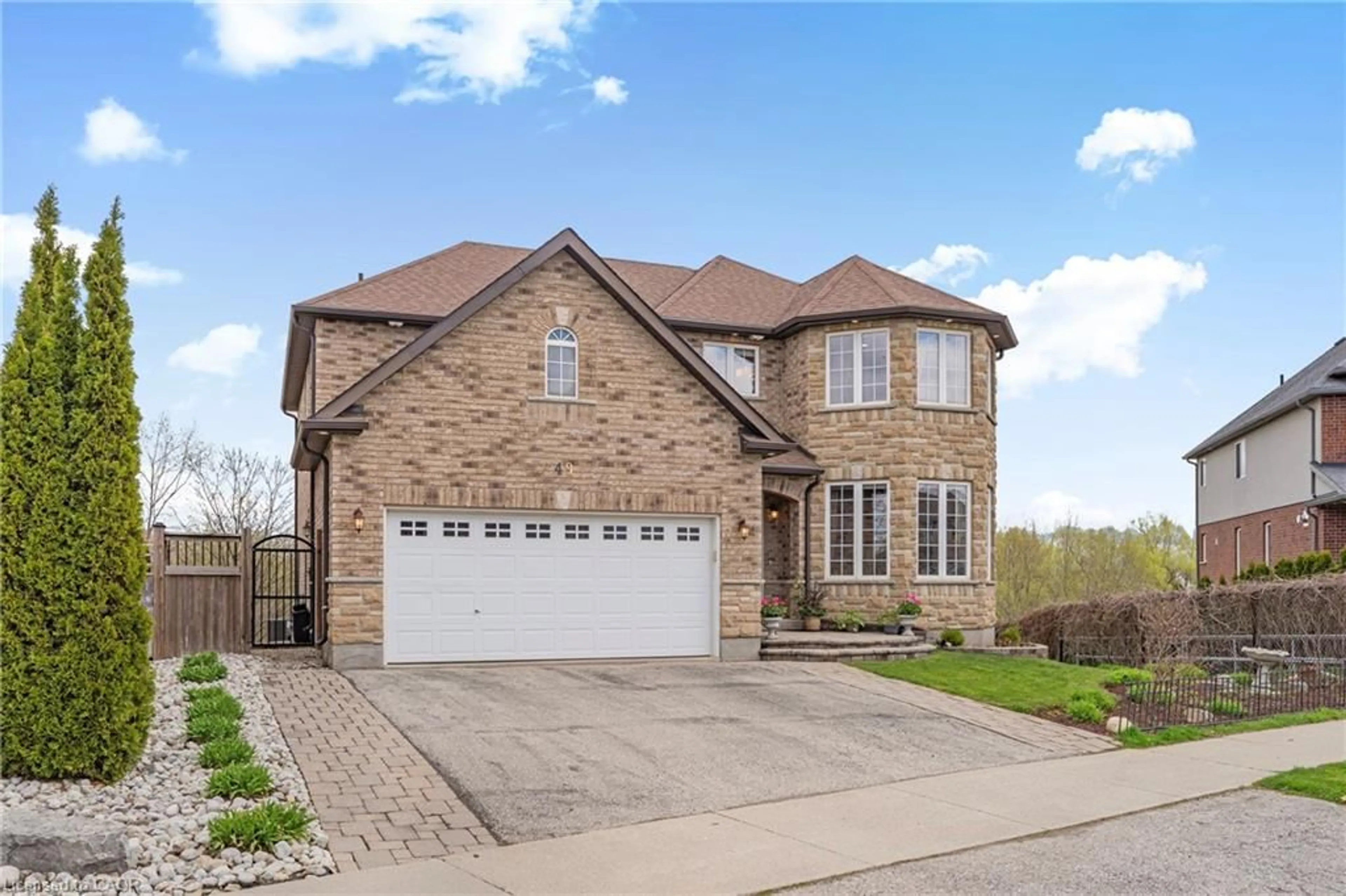 Home with brick exterior material, street for 49 Creighton Ave, Guelph Ontario N1E 0H6