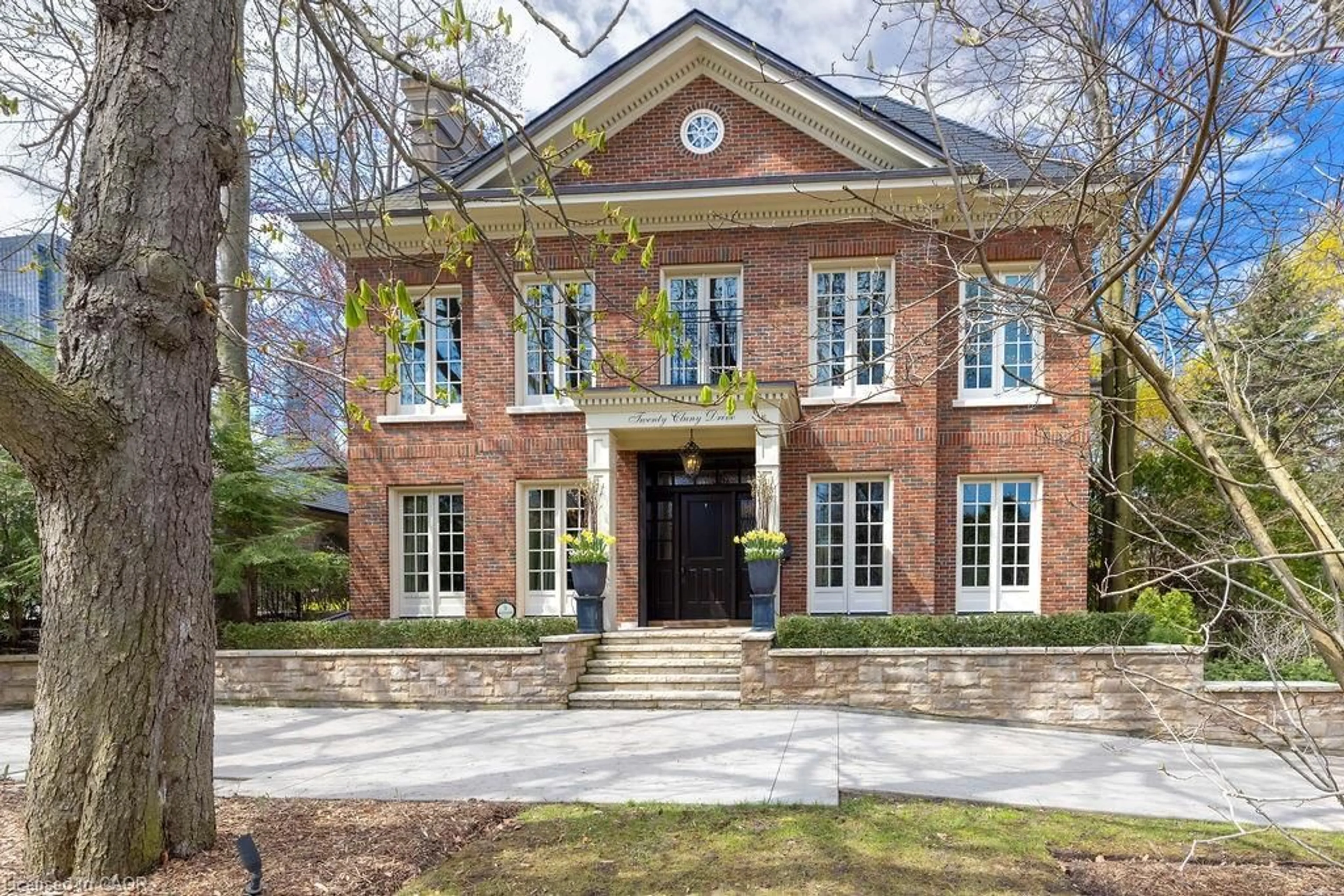 Home with brick exterior material, street for 20 Cluny Dr, Toronto Ontario M4W 2P7