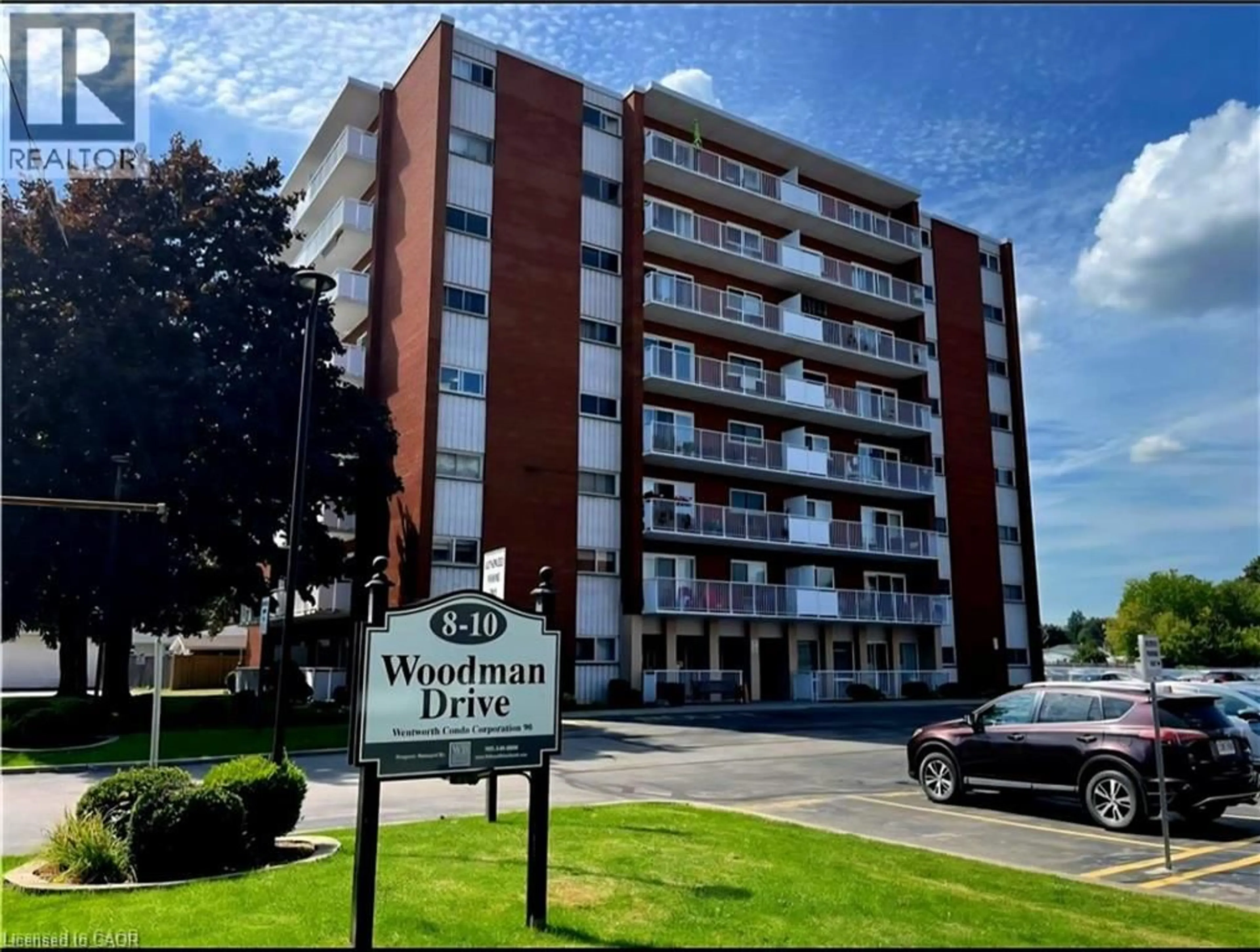 A pic from outside/outdoor area/front of a property/back of a property/a pic from drone, street for 10 Woodman Dr #108, Hamilton Ontario L8K 4E1
