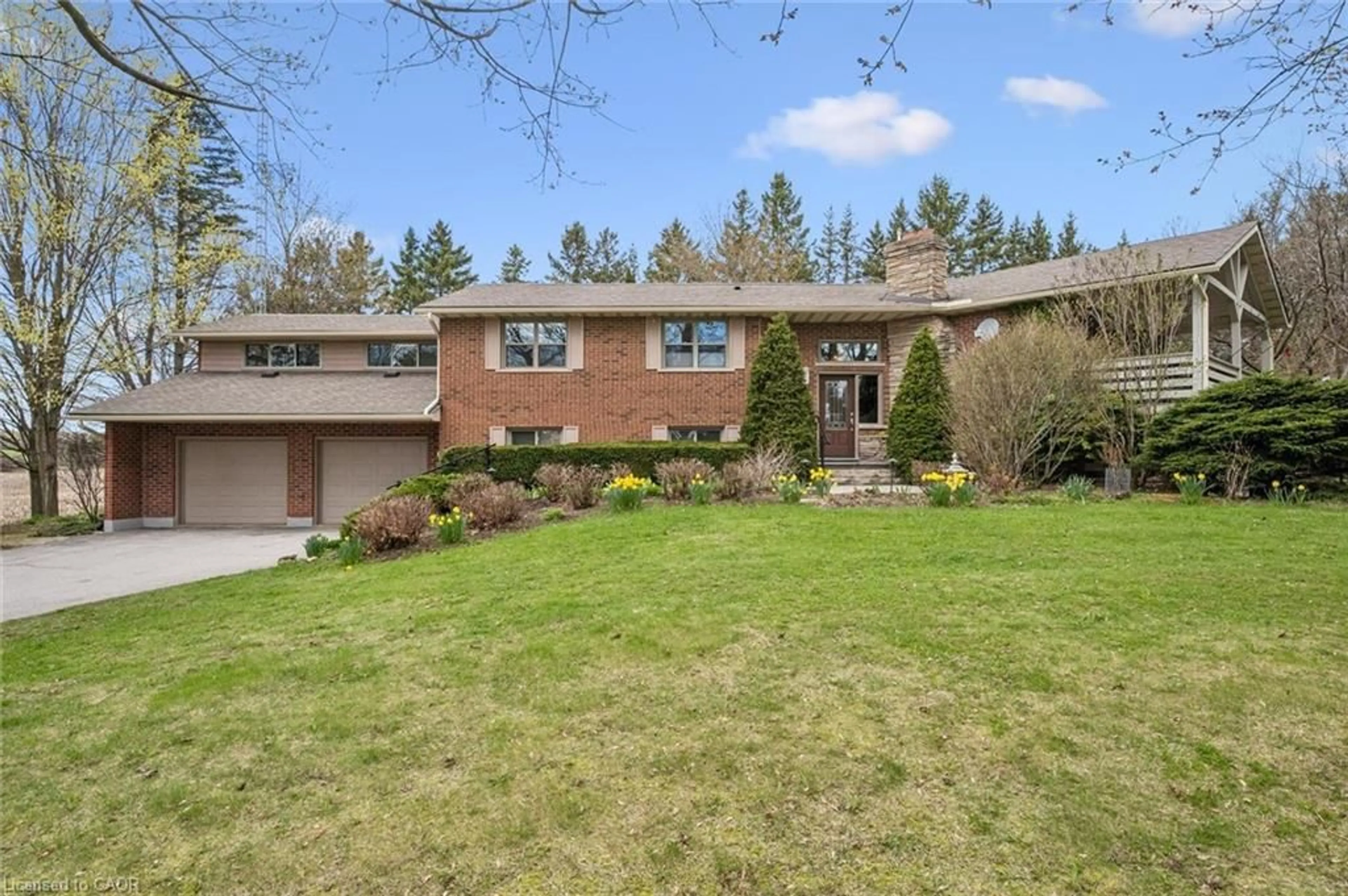 Home with brick exterior material, street for 7690 Mill Rd, Guelph Ontario N1H 6J1