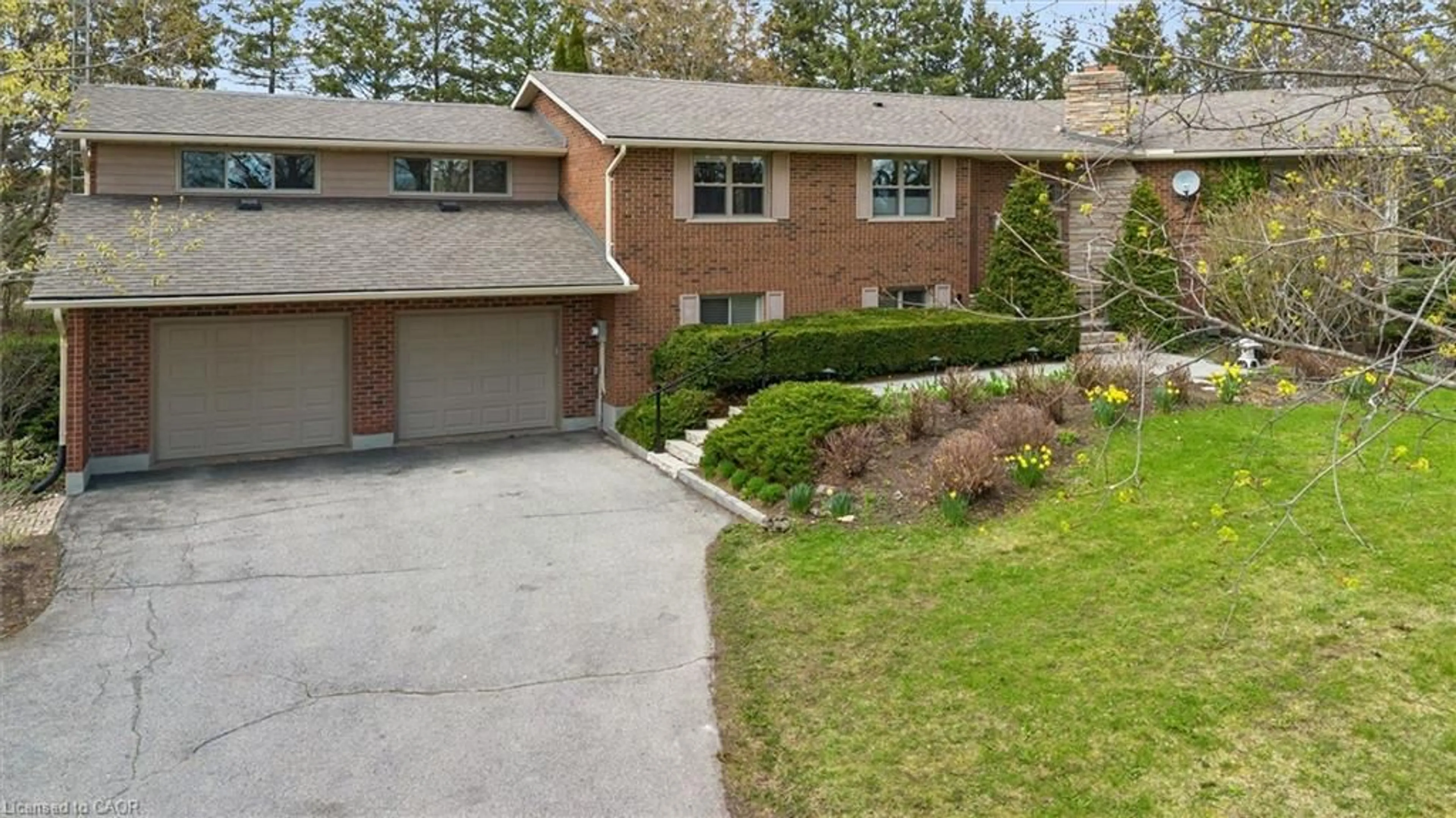 Home with brick exterior material, street for 7690 Mill Rd, Guelph Ontario N1H 6J1