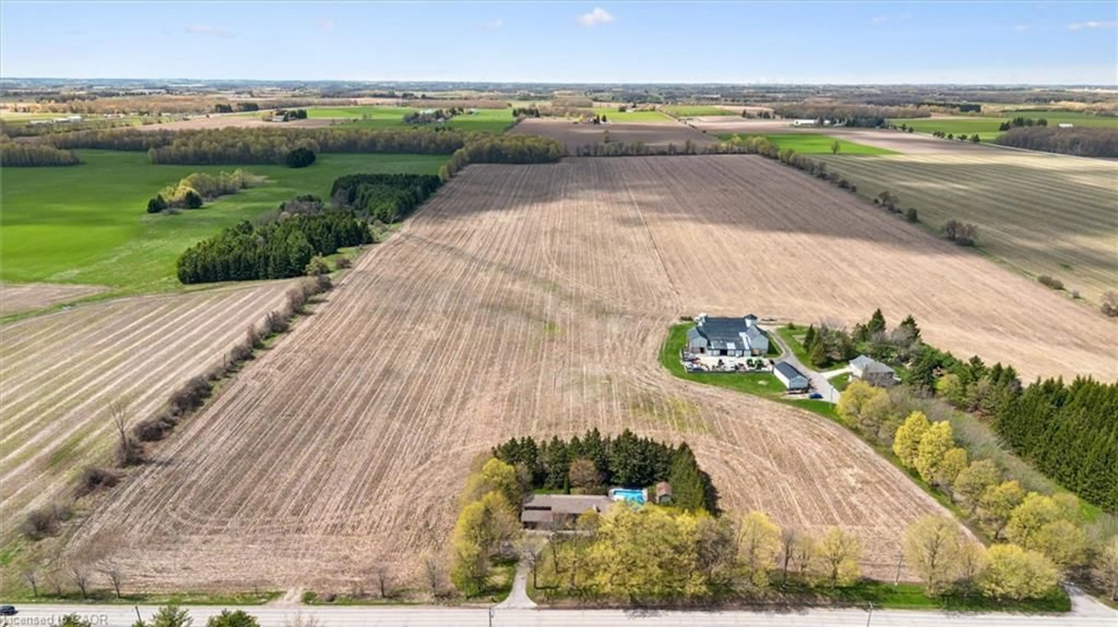 A pic from outside/outdoor area/front of a property/back of a property/a pic from drone, water/lake/river/ocean view for 7690 Mill Rd, Guelph Ontario N1H 6J1