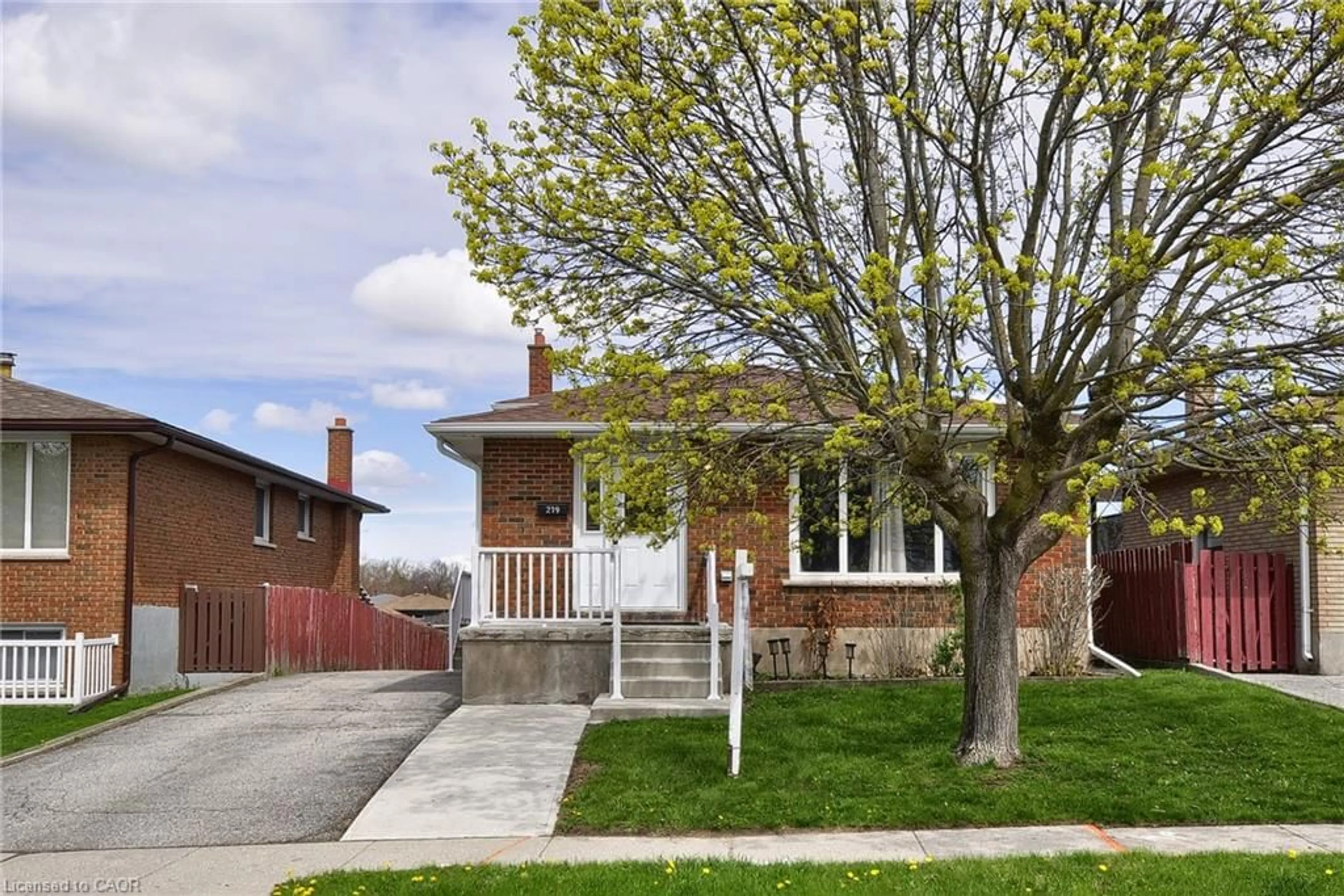 Home with brick exterior material, street for 219 Bakersfield Dr, Cambridge Ontario N1R 6X9