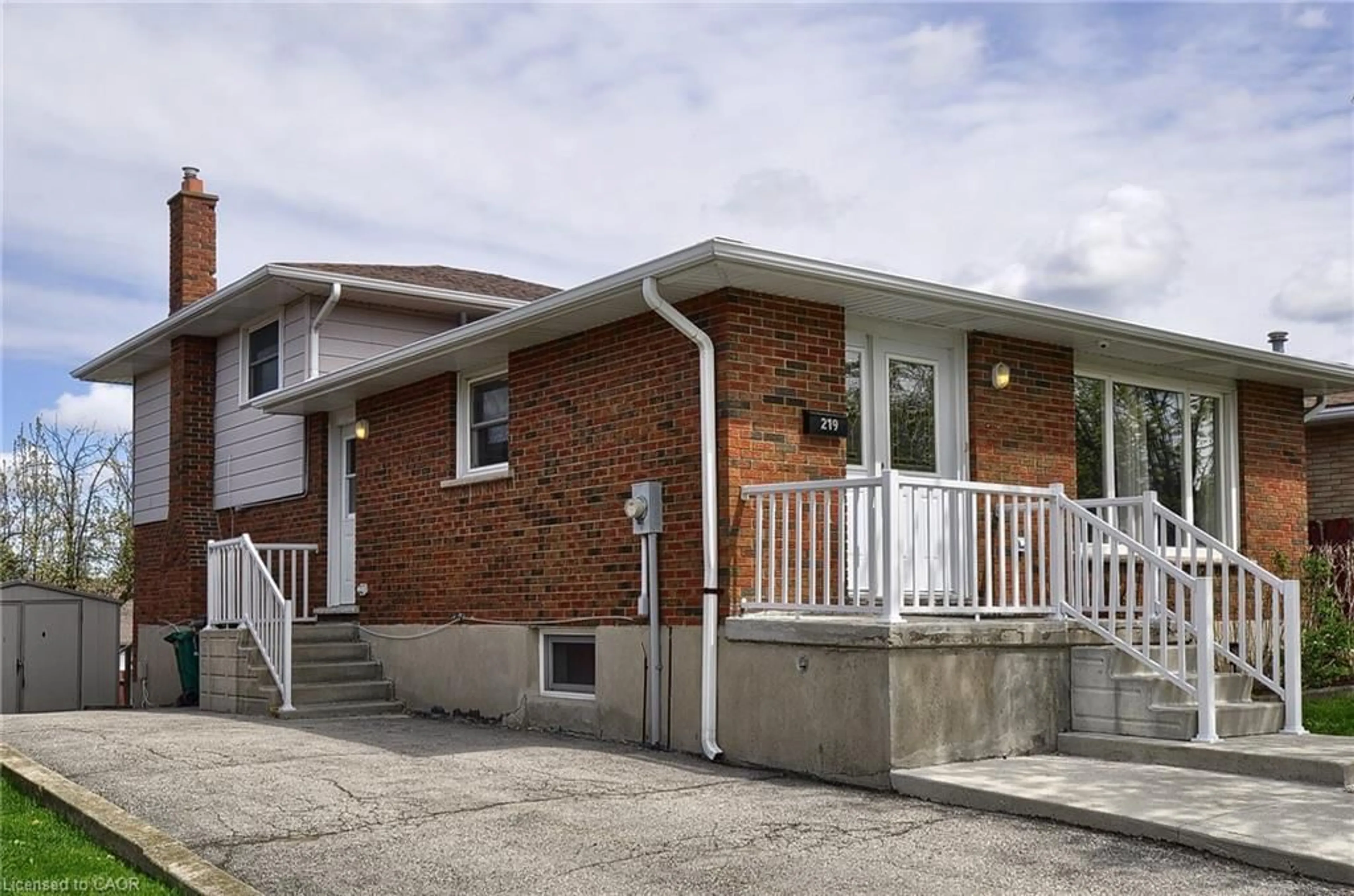 Home with brick exterior material, street for 219 Bakersfield Dr, Cambridge Ontario N1R 6X9