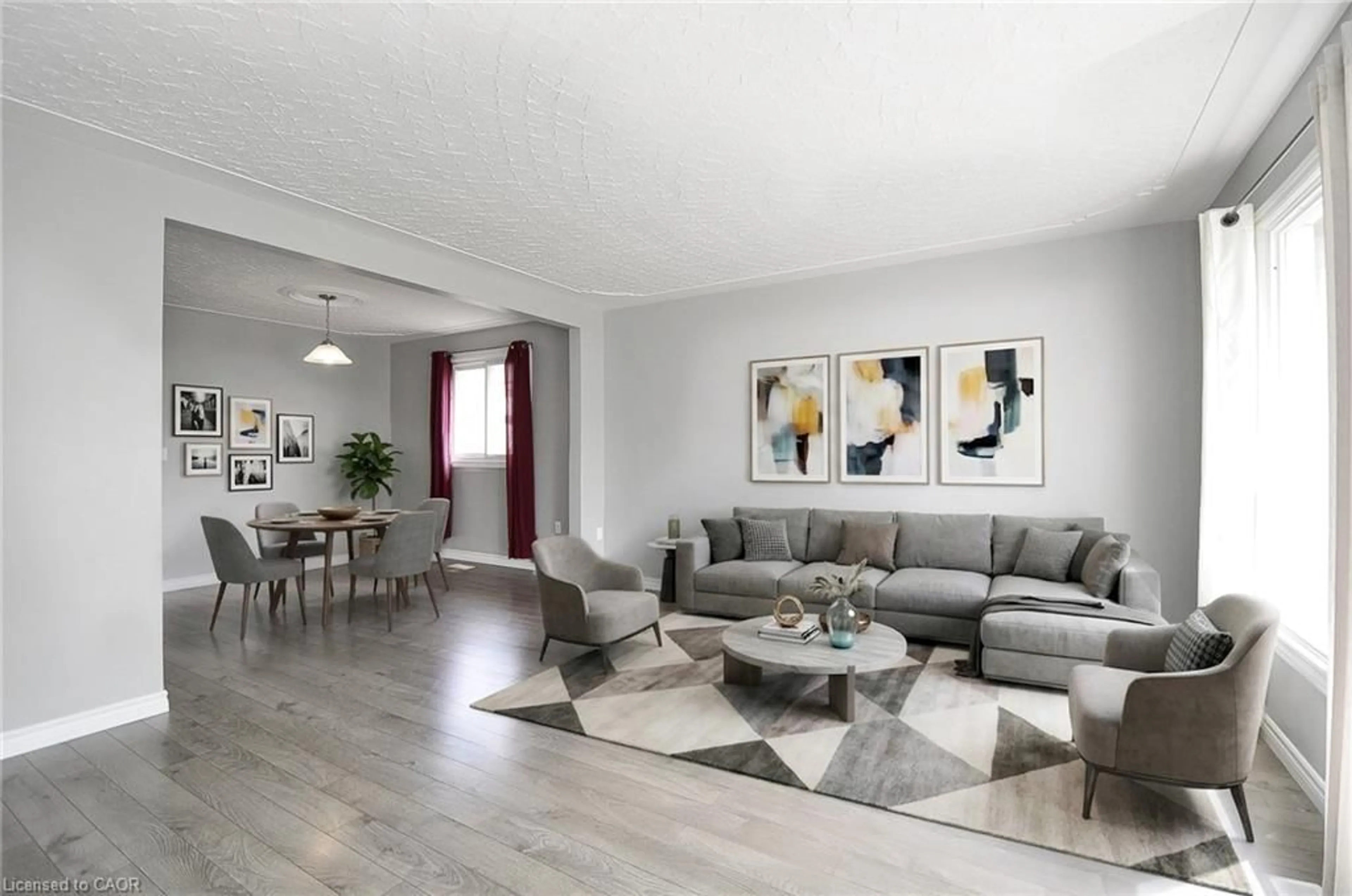 Living room with furniture, wood/laminate floor for 219 Bakersfield Dr, Cambridge Ontario N1R 6X9