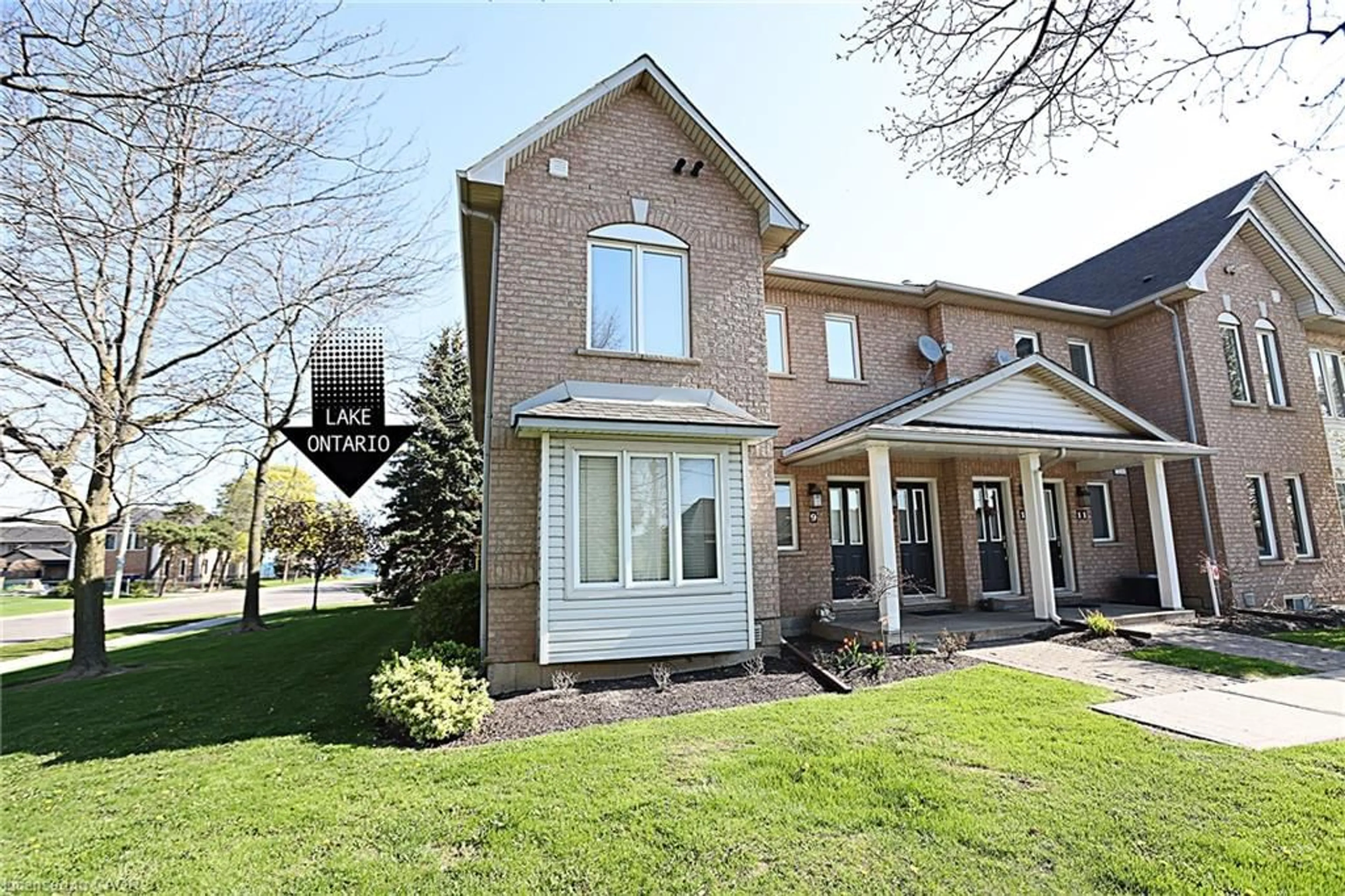 Home with brick exterior material, street for 2 Harbour Dr #9, Hamilton Ontario L8E 6B1