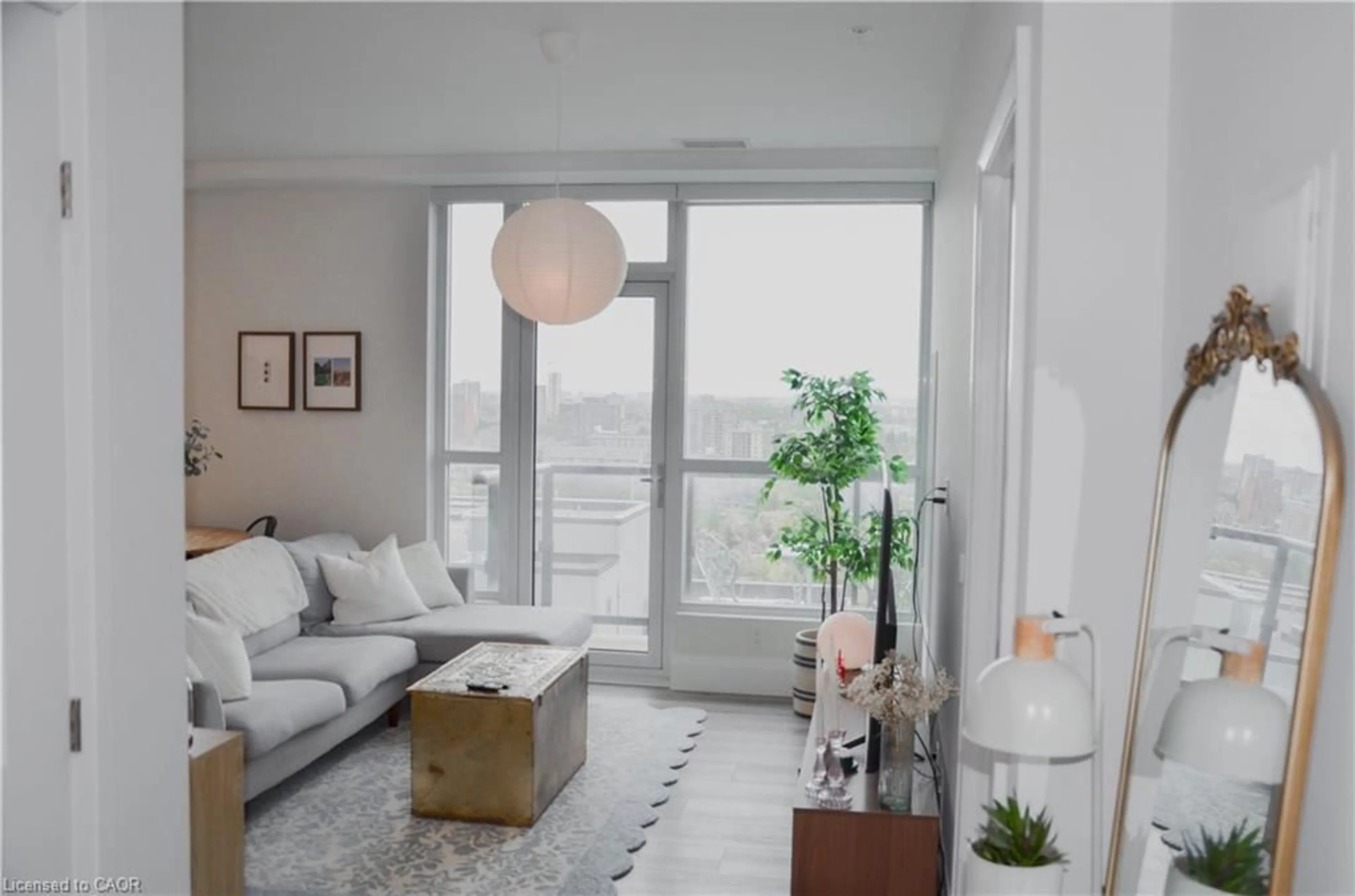Living room with furniture, unknown for 104 Garment St #2103, Kitchener Ontario N2G 0C8