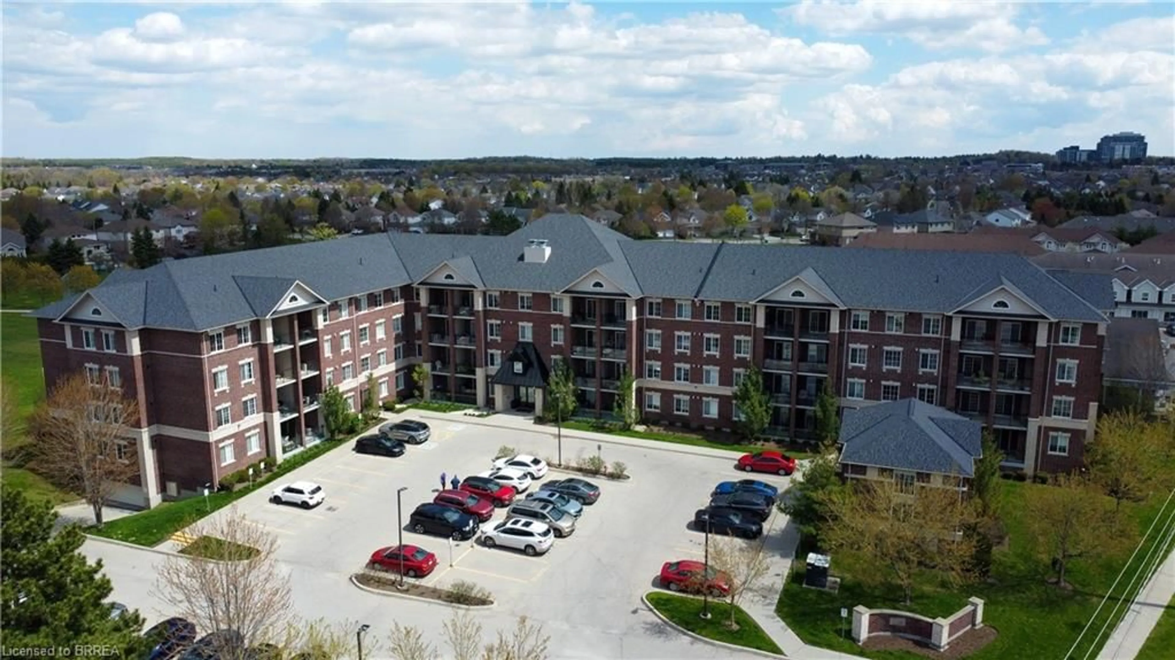A pic from outside/outdoor area/front of a property/back of a property/a pic from drone, unknown for 1440 Gordon St #316, Guelph Ontario N1L 1C8