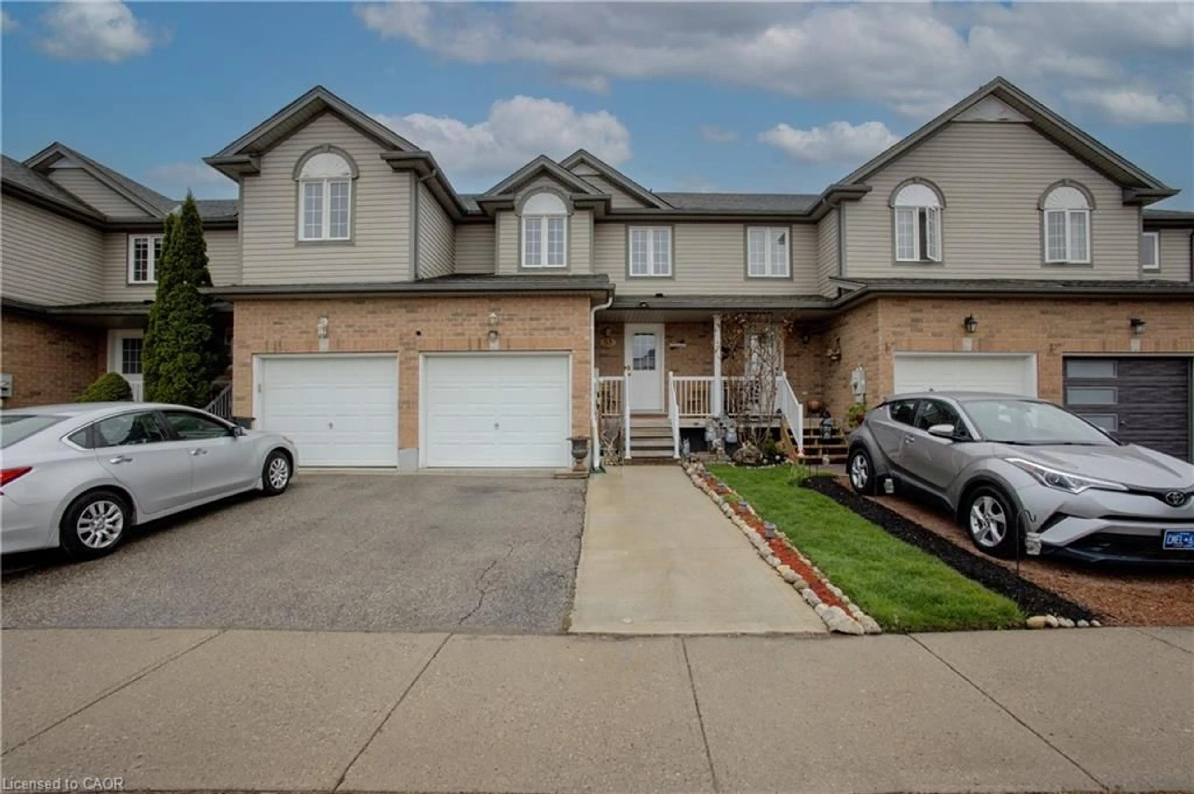 Home with brick exterior material, street for 53 Prosperity Dr, Kitchener Ontario N2E 4A9