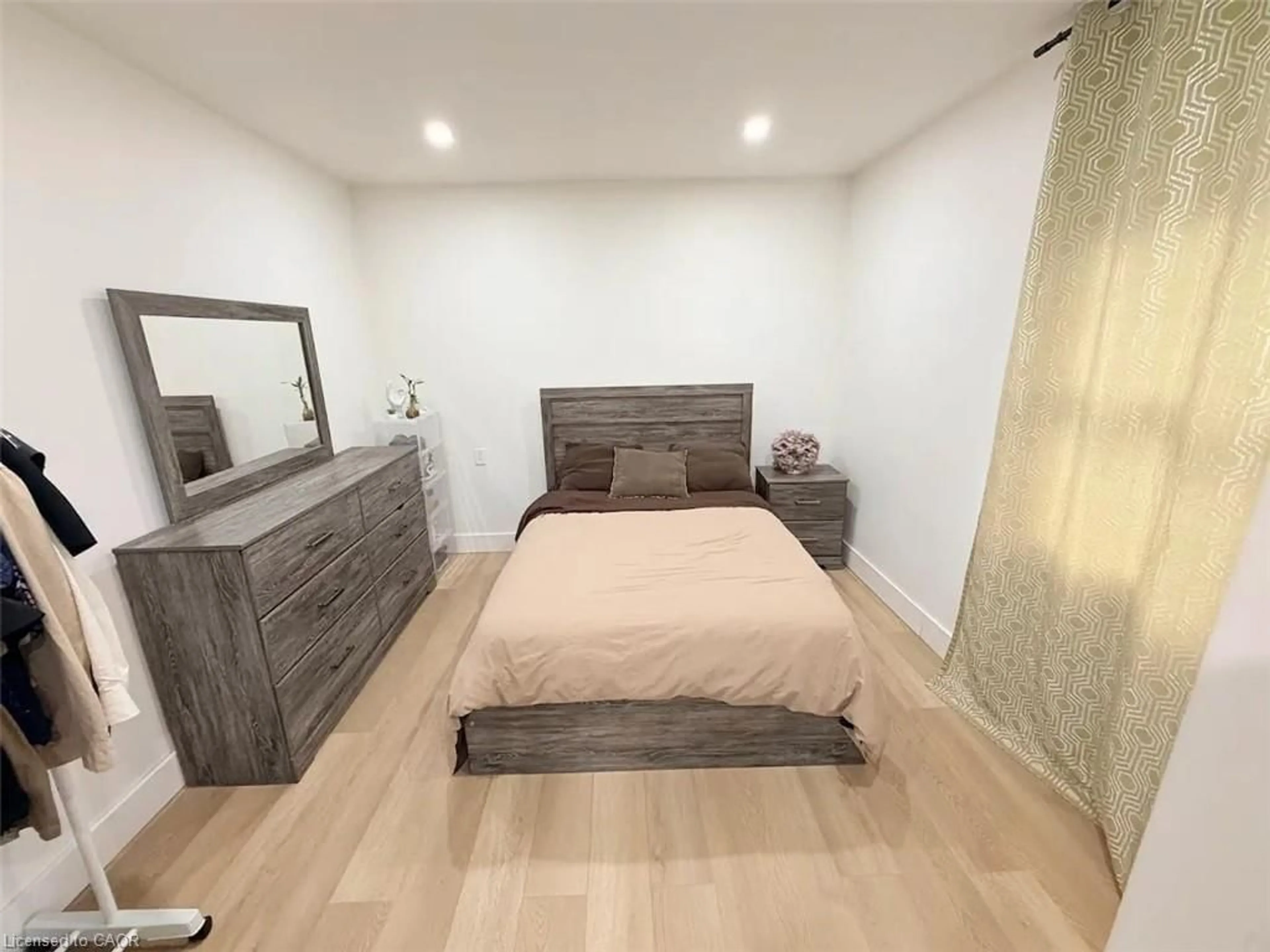 Bedroom with bed, wood/laminate floor for 190 Helena Ave, London Ontario N5Z 3M2