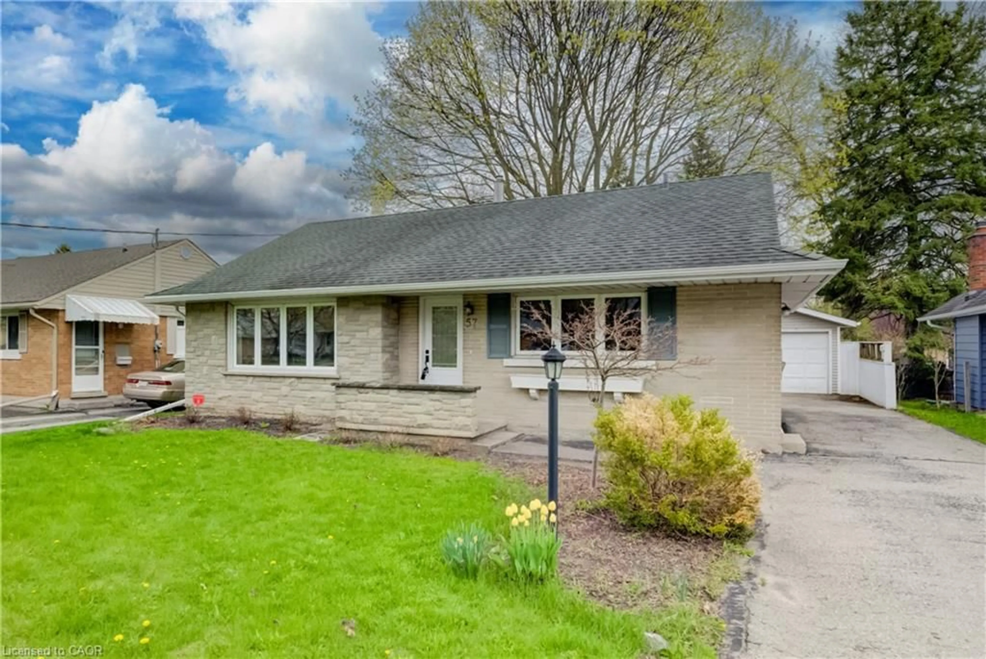 Home with vinyl exterior material, street for 57 Jack Ave, Kitchener Ontario N2M 1Z9