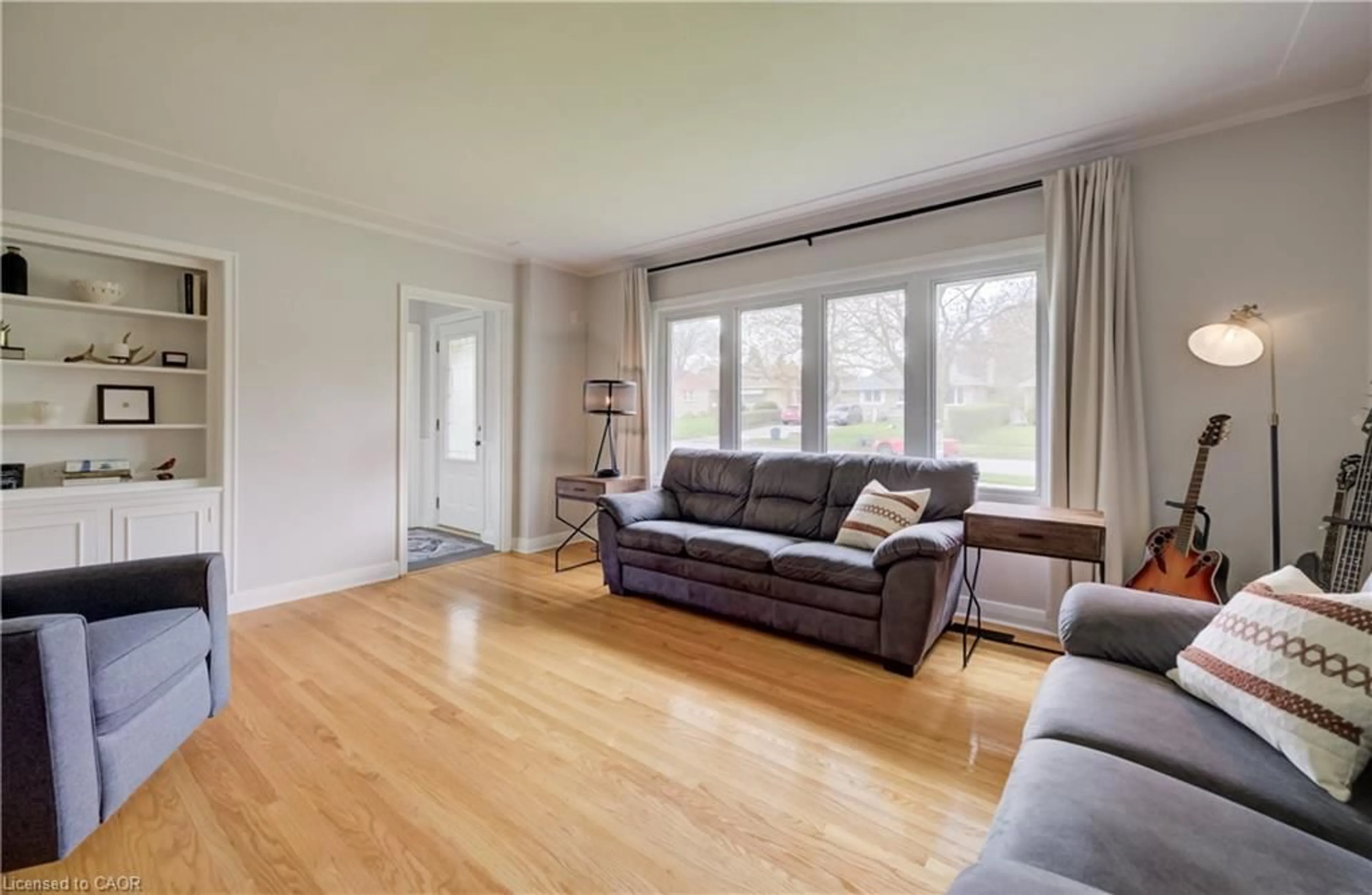 Living room with furniture, wood/laminate floor for 57 Jack Ave, Kitchener Ontario N2M 1Z9