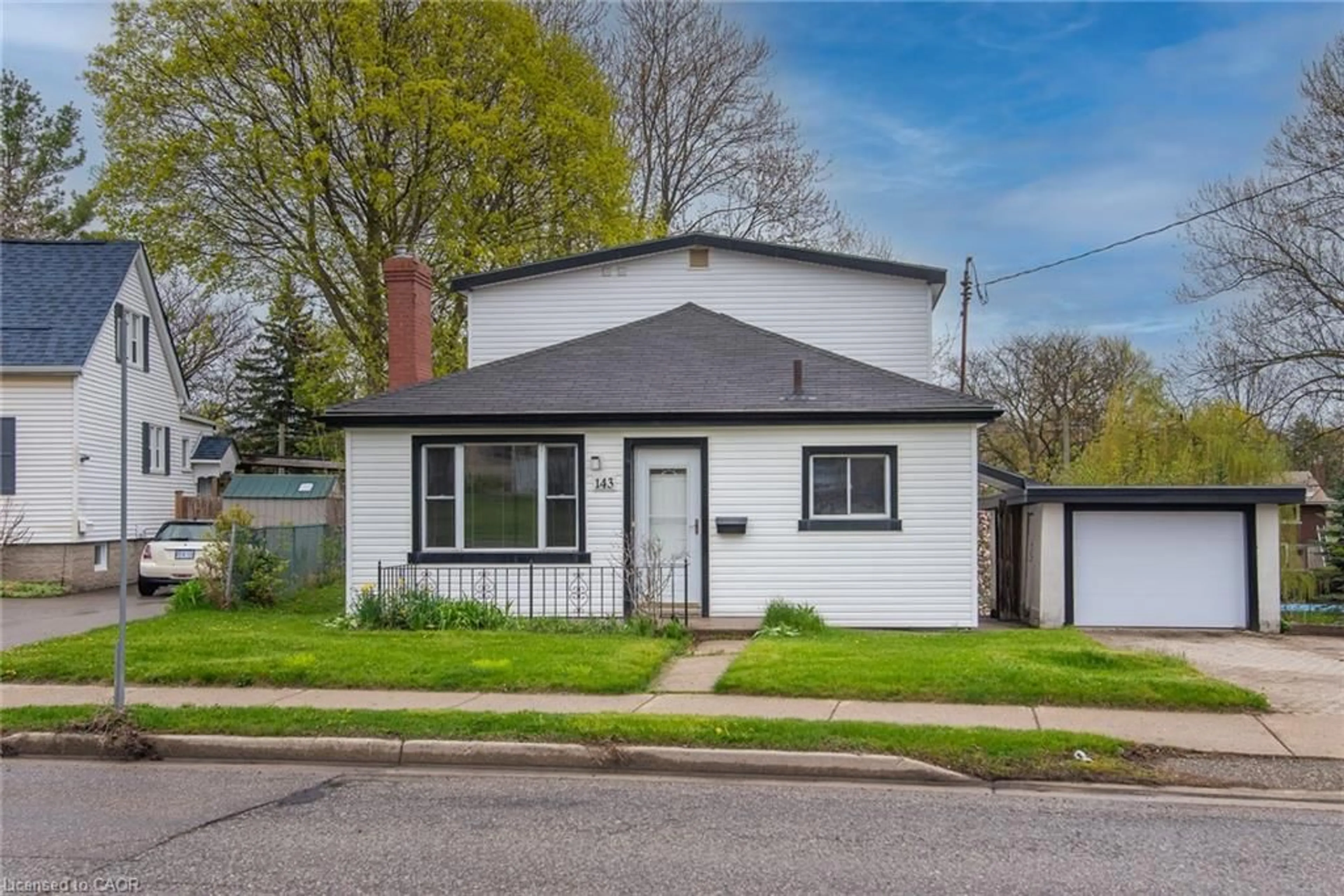 Home with vinyl exterior material, street for 143 Bridgeport Rd, Waterloo Ontario N2J 2K3