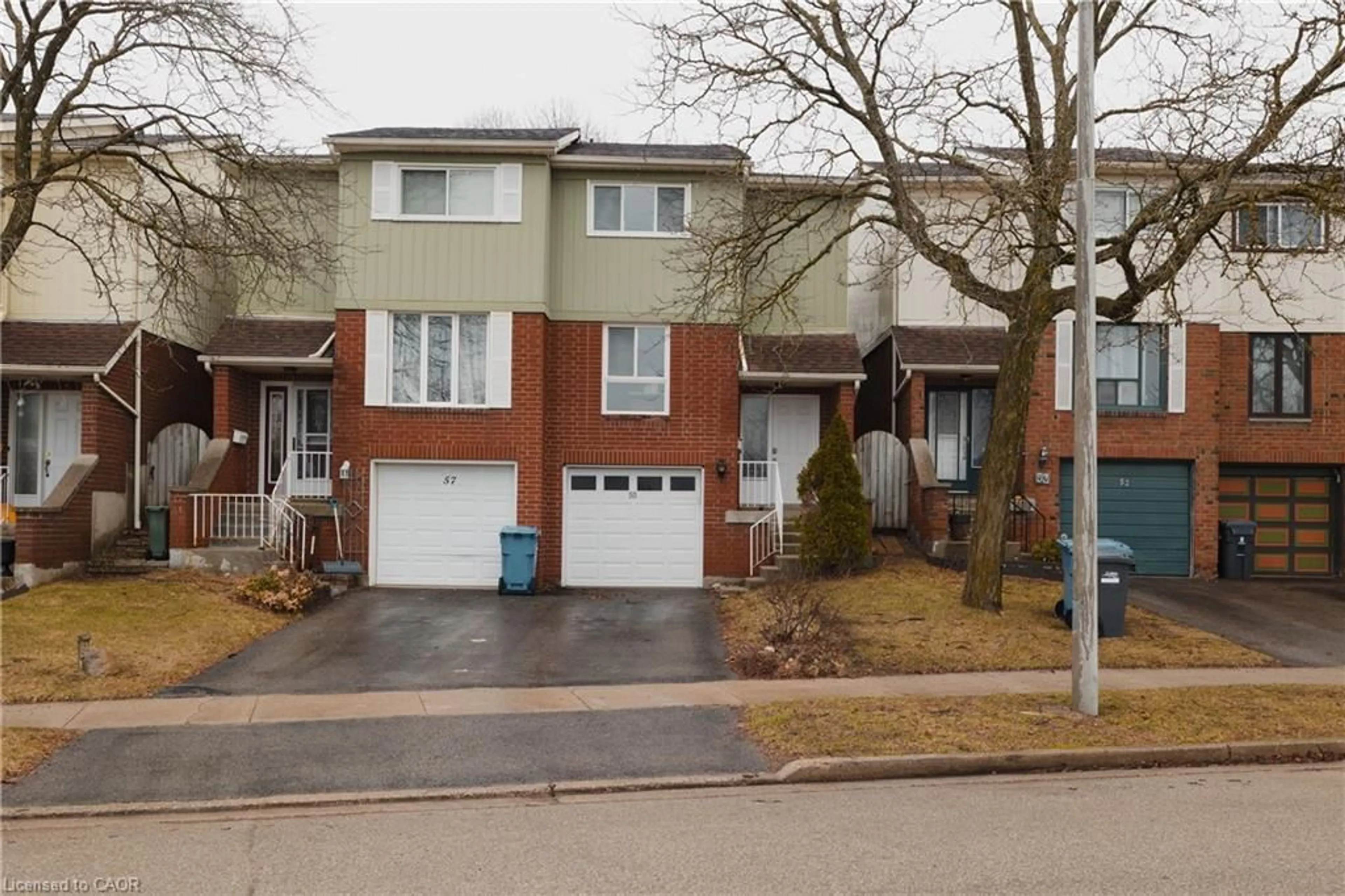 Home with brick exterior material, street for 55 Dovercliffe Road Rd, Guelph Ontario N1G 2Z6