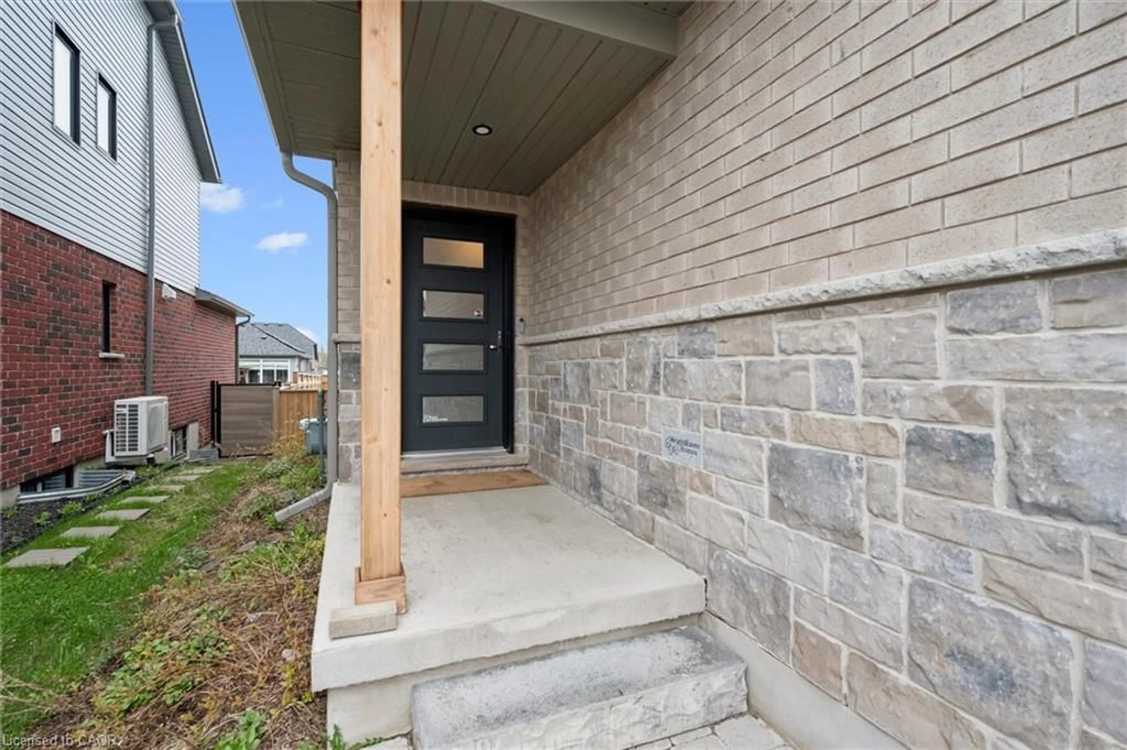 Home with brick exterior material, street for 163 Halls Dr, Elora Ontario N0B 1S0