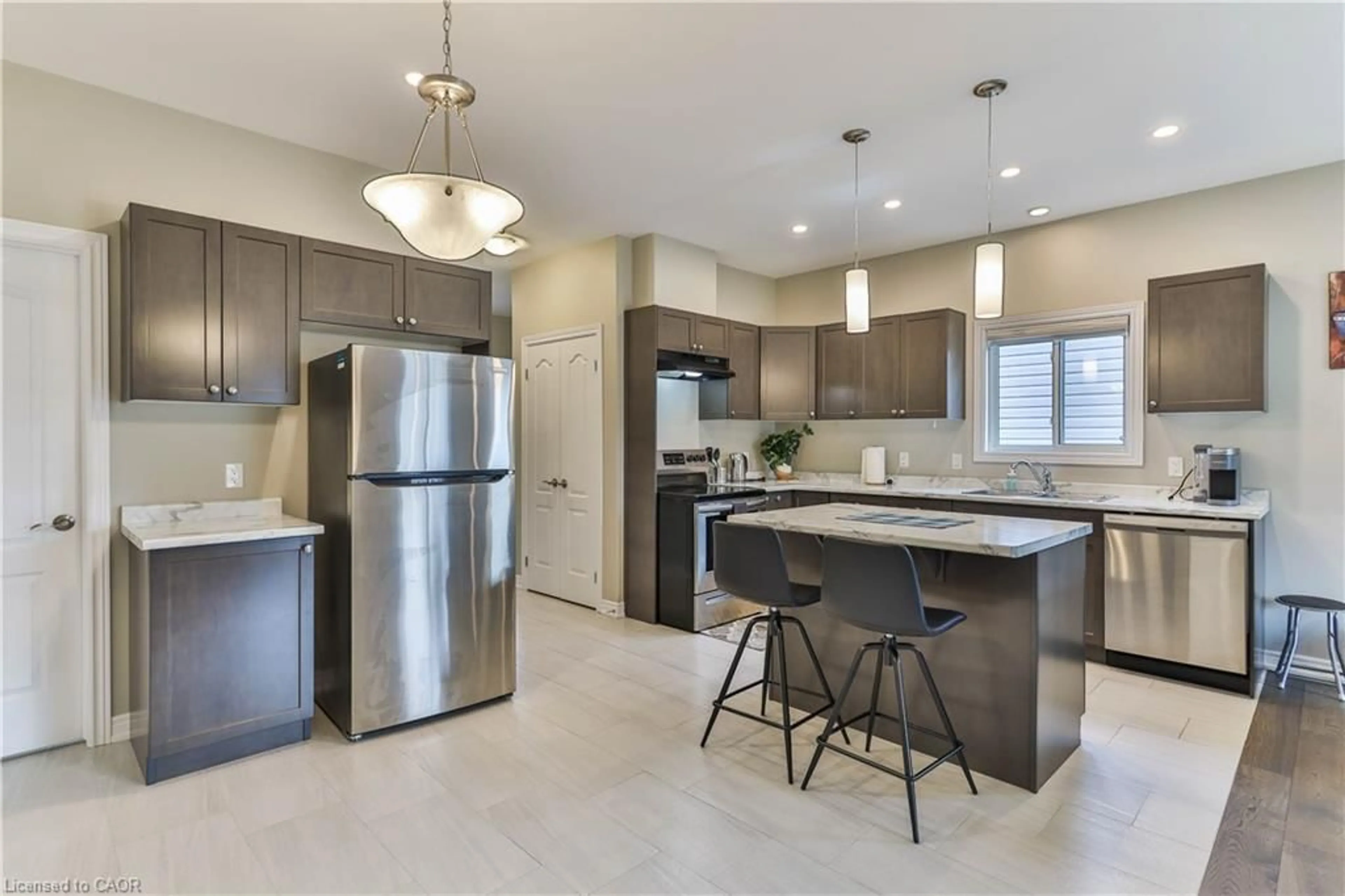 Open concept kitchen, ceramic/tile floor for 11 Tucker St, Thorold Ontario L2V 0G3