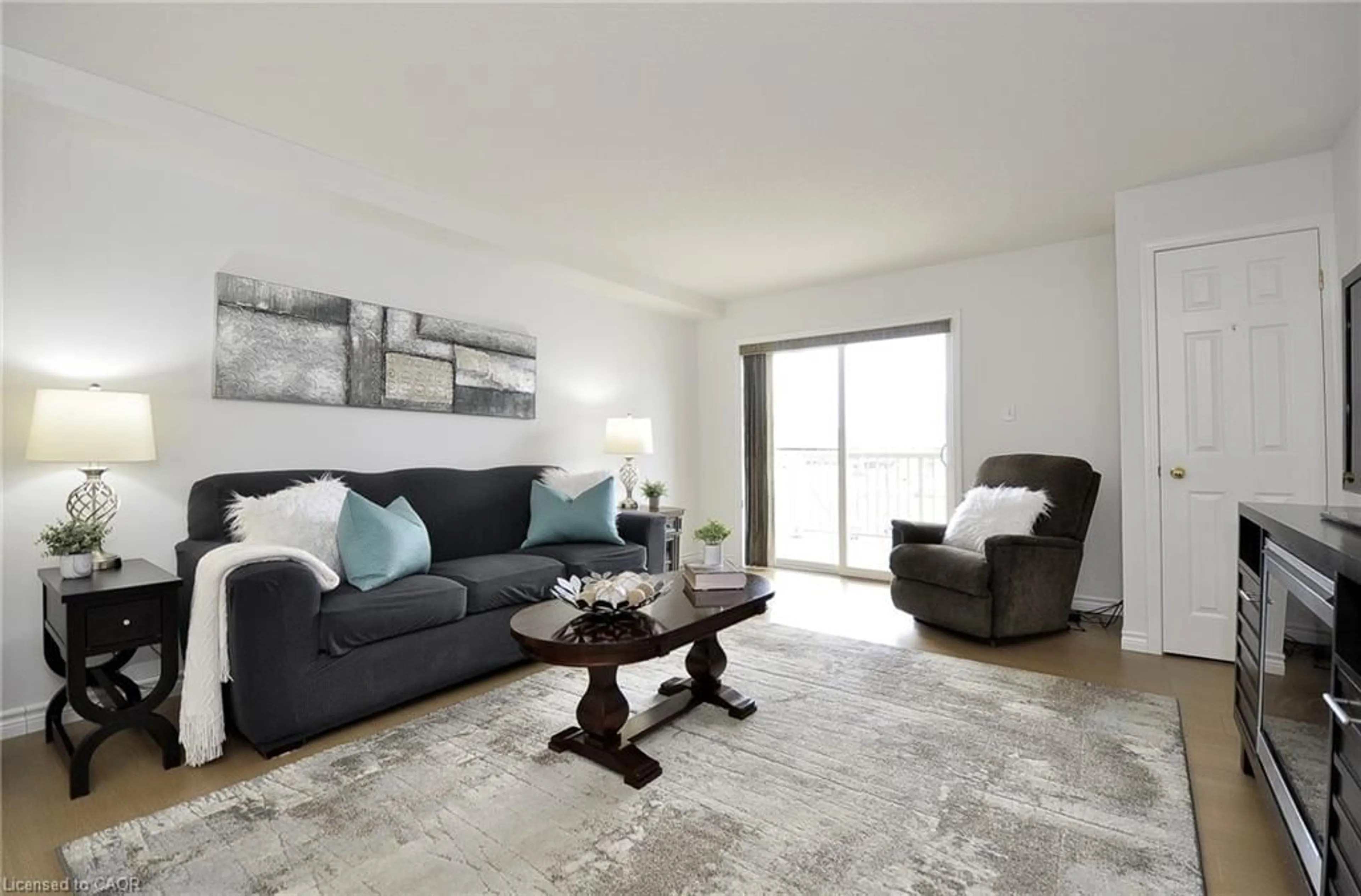 Living room with furniture, unknown for 345 Fisher Mills Rd #102, Cambridge Ontario N3C 0E5