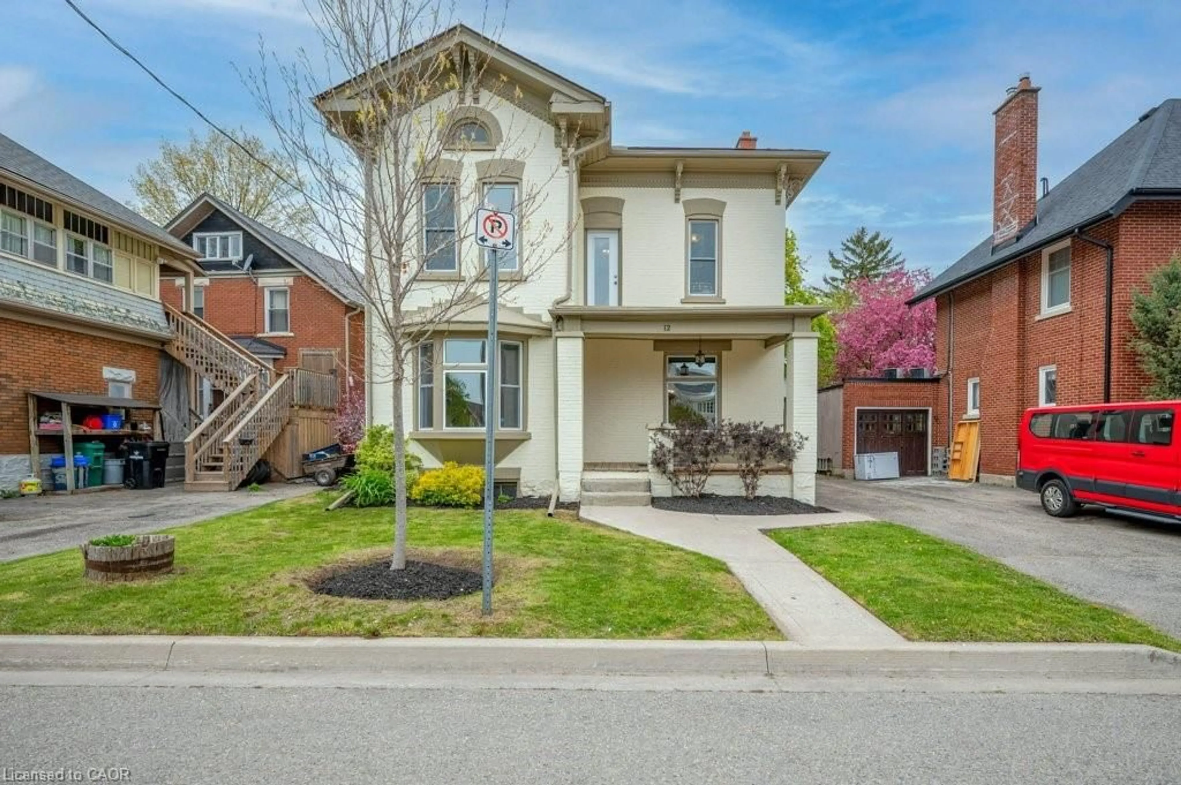 Home with brick exterior material, street for 12 Clarence Pl, Kitchener Ontario N2H 2L2
